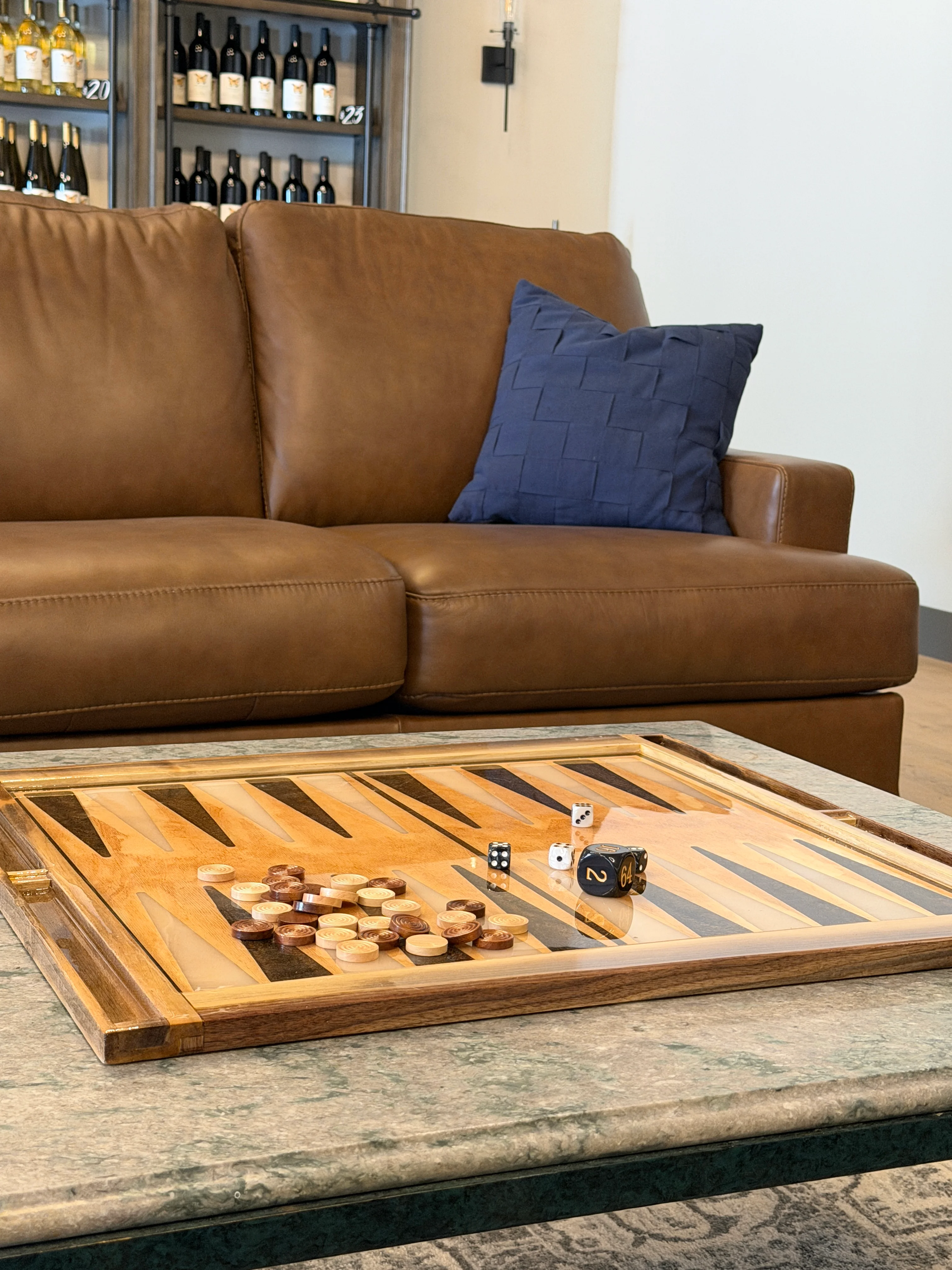 Cozy lounge area with a backgammon board and leather sofa