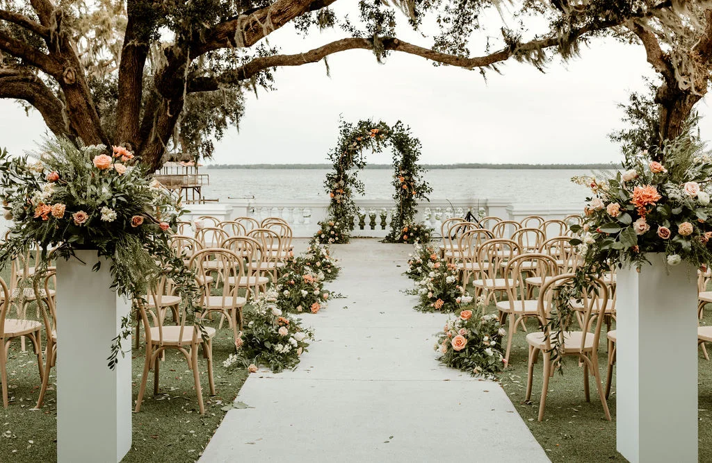 Beautiful outdoor wedding setup by the water