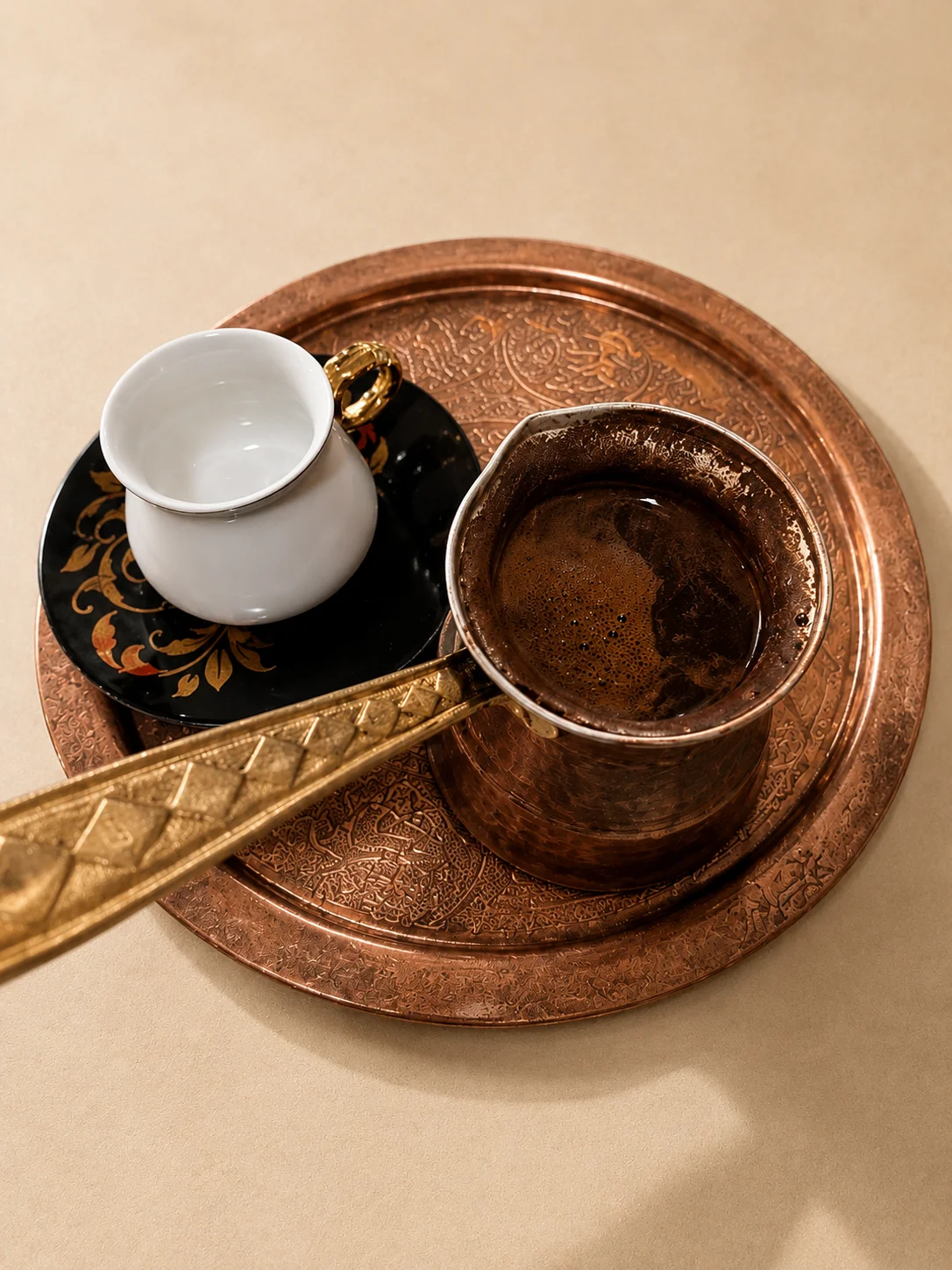 cardamom to hot Turkish coffee served on tray with small cup and pot. fresh and strong.