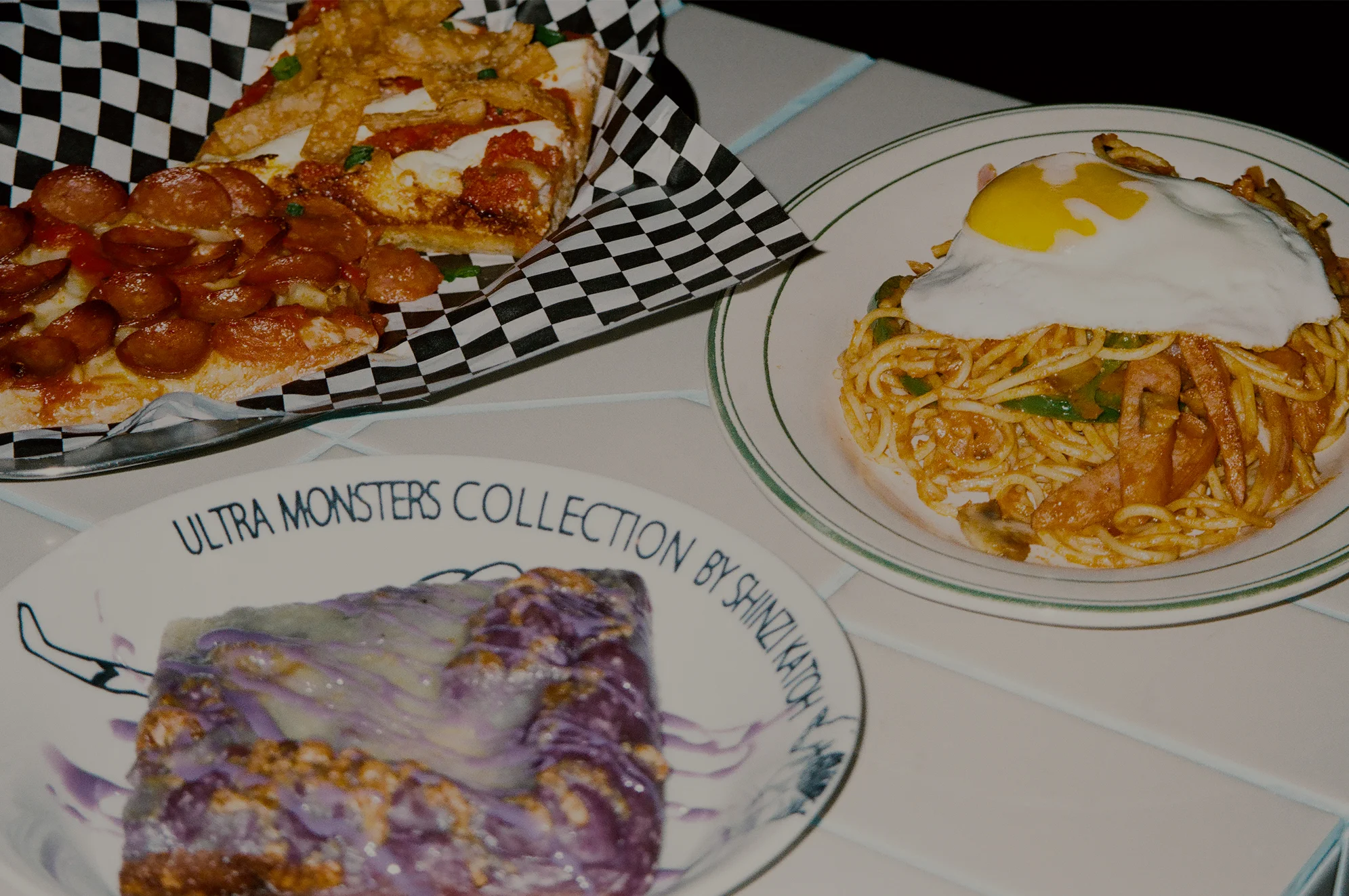 Filipino spaghetti topped with egg and savory sauce