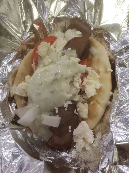 Greek dishes including Gyros