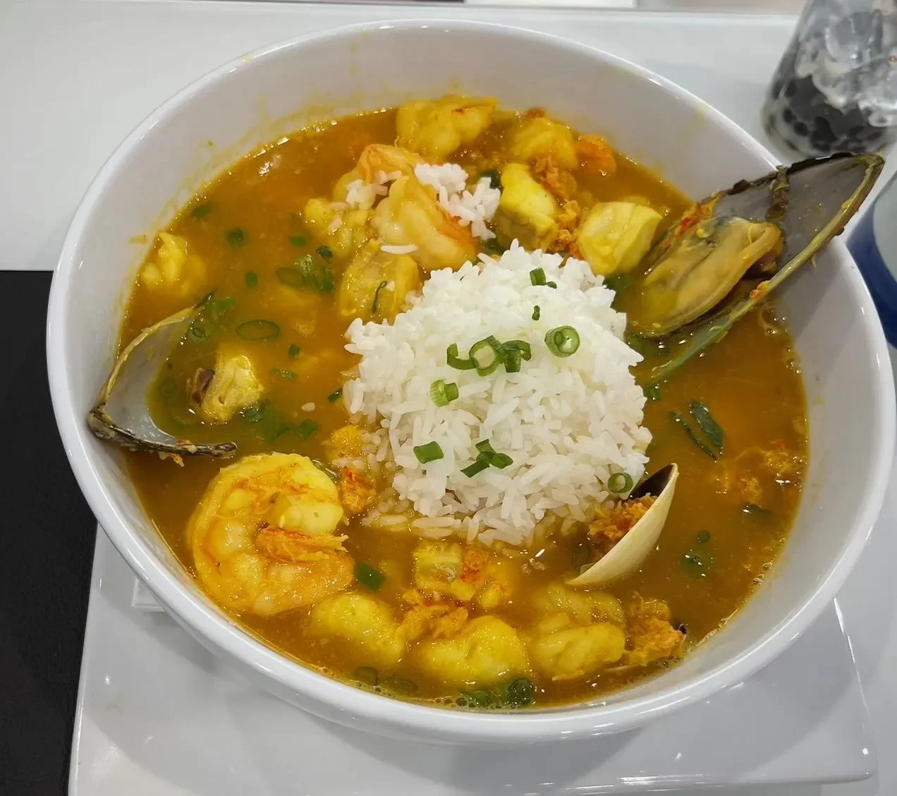 Delicious bowl of Malaysian laksa with shrimp and rice