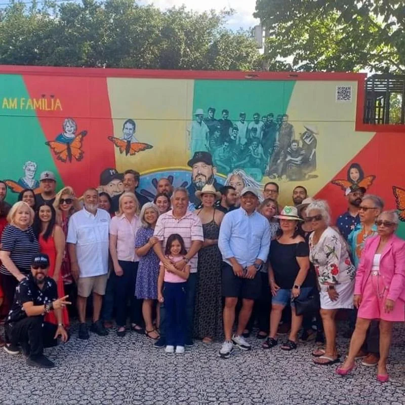 The full family at the mural 