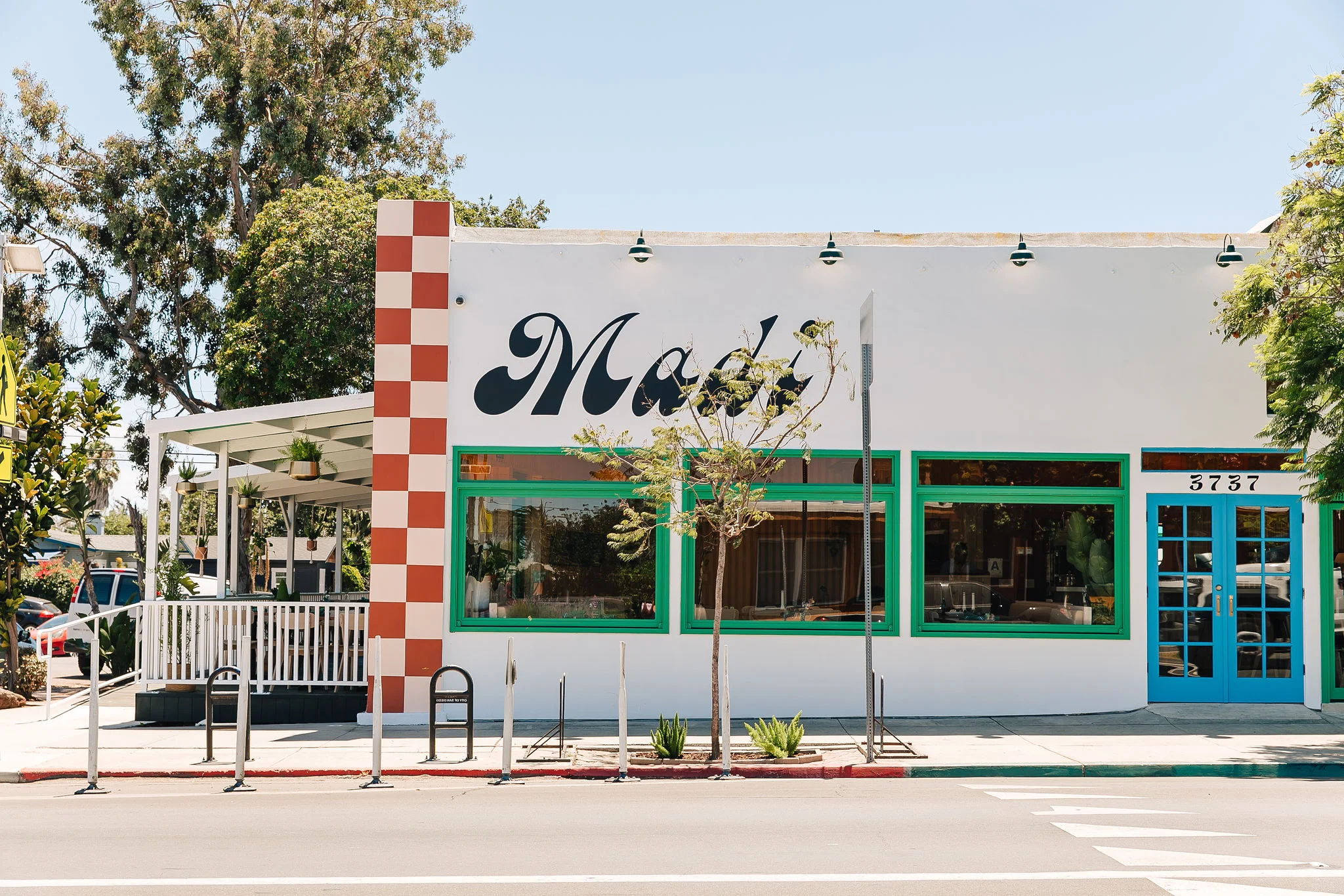 Charming restaurant exterior with colorful design and outdoor seating
