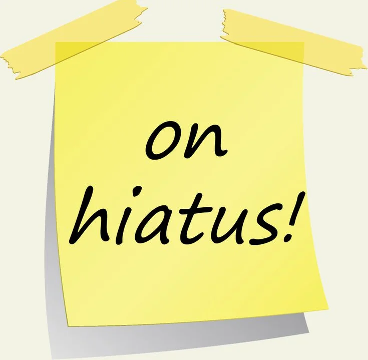 Yellow sticky note stating 'on hiatus'