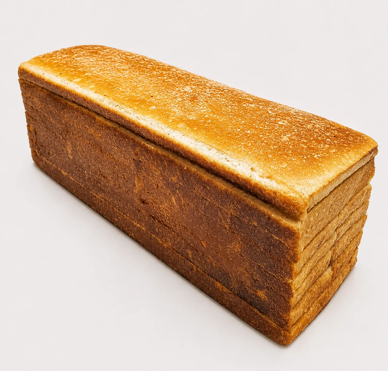 Freshly baked loaf of bread with a golden crust.