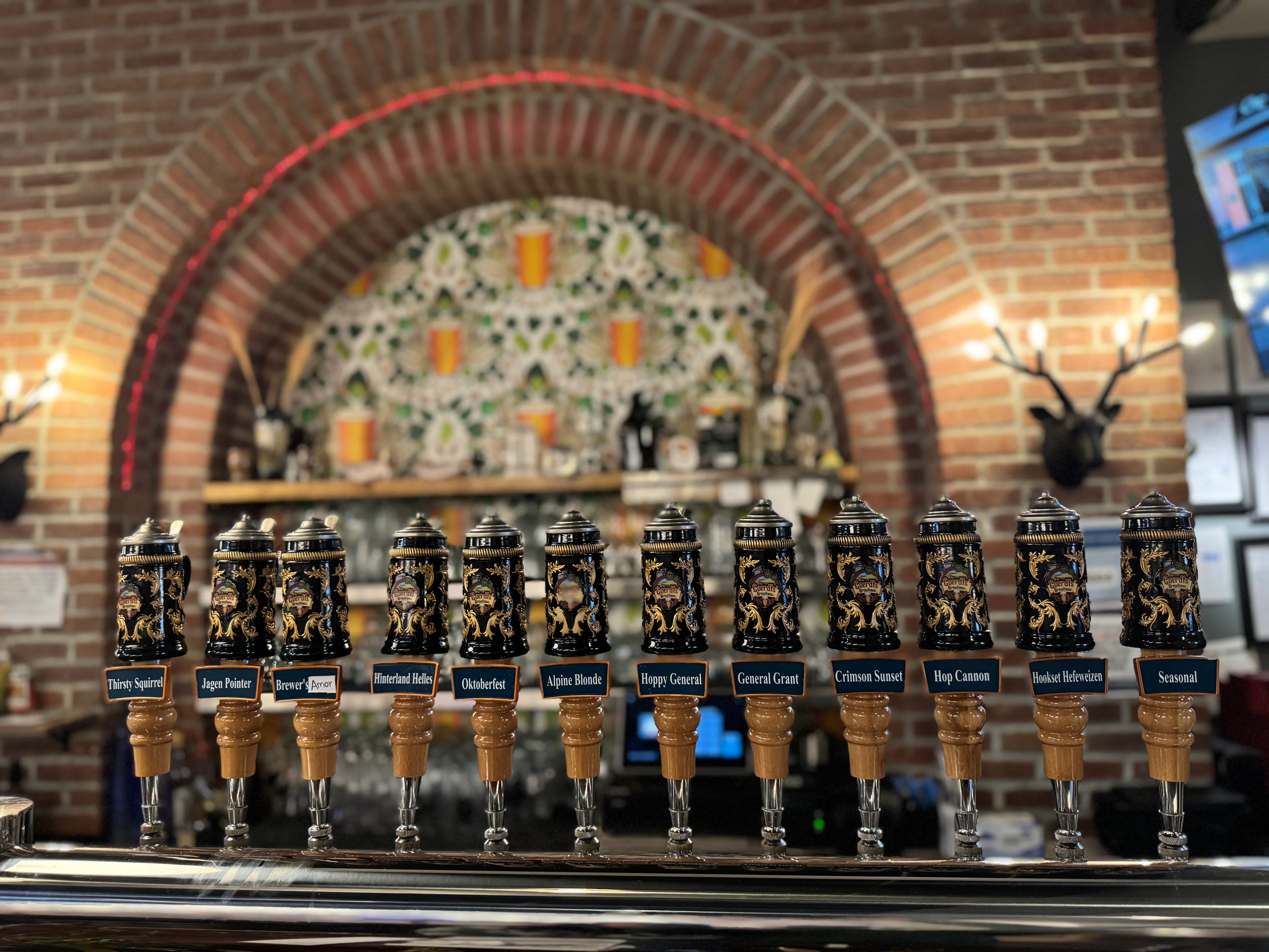 Craft beer taps in a rustic bar setting
