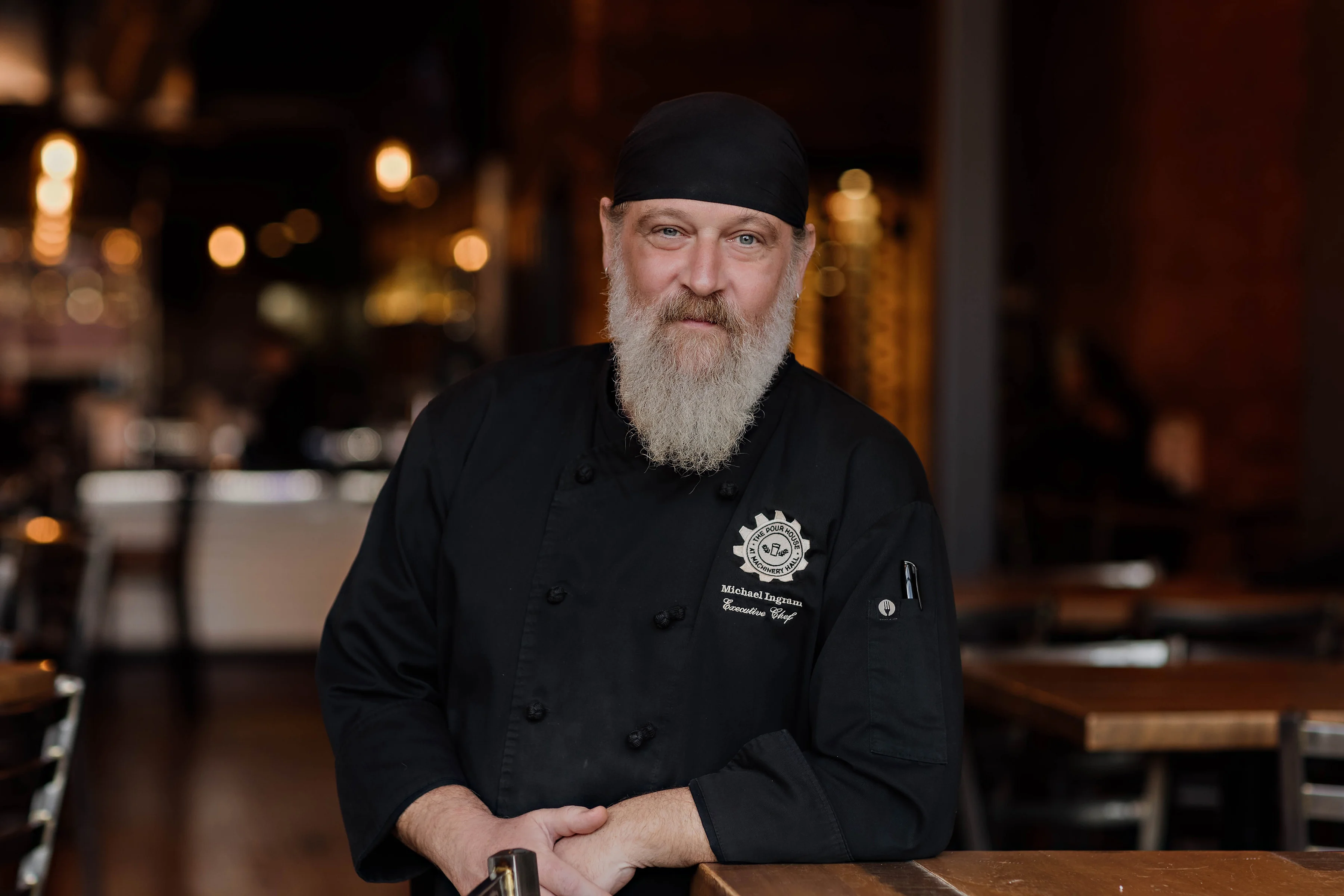 Chef in a restaurant with a warm ambiance