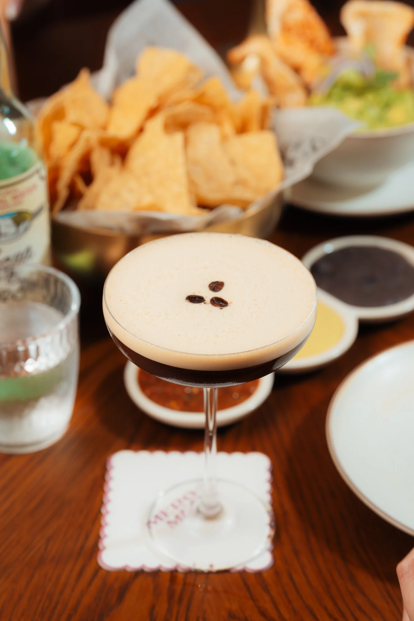 Espresso martini cocktail with coffee beans on top