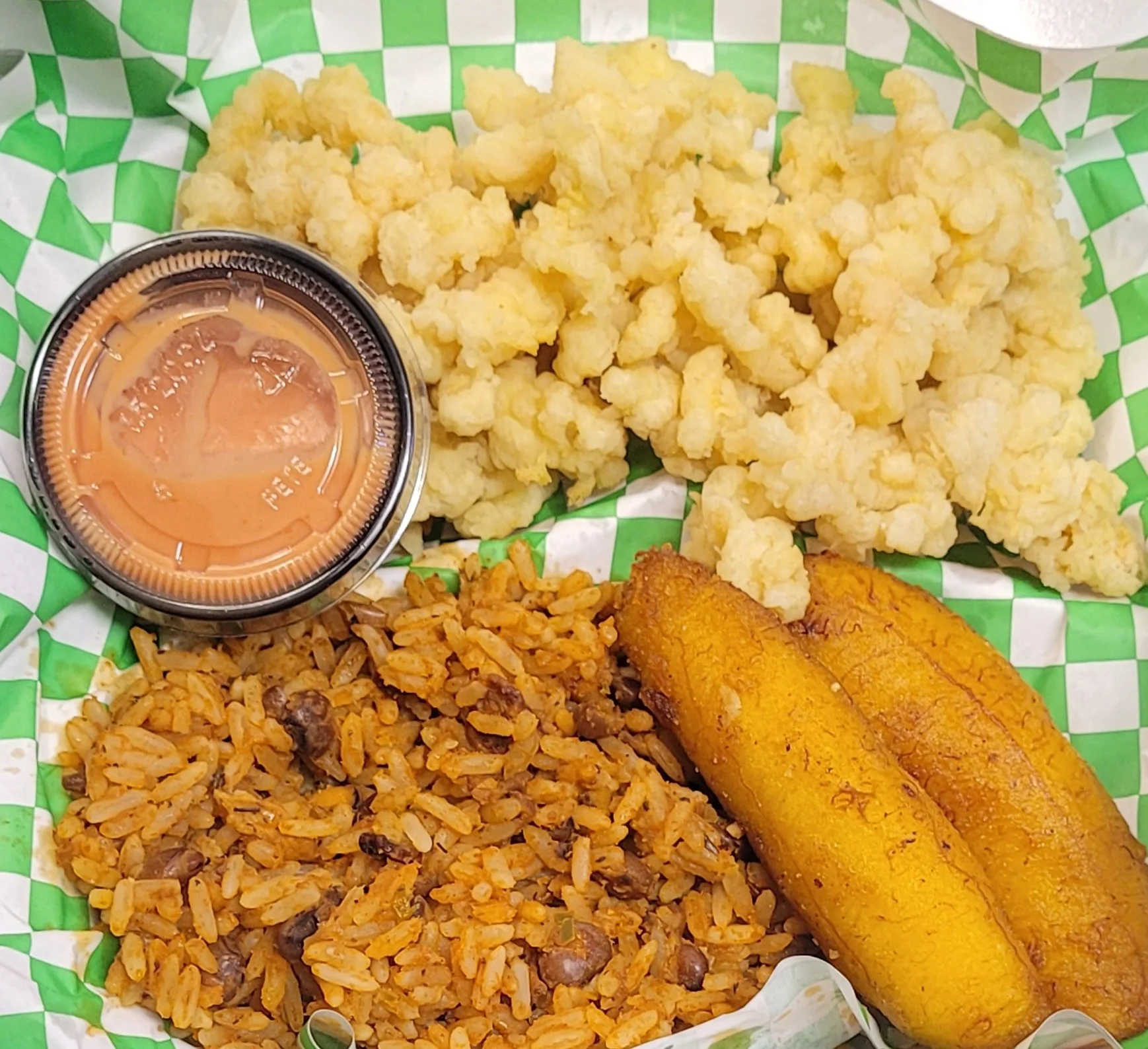 Delicious Caribbean rice and peas with fried plantains and dipping sauce