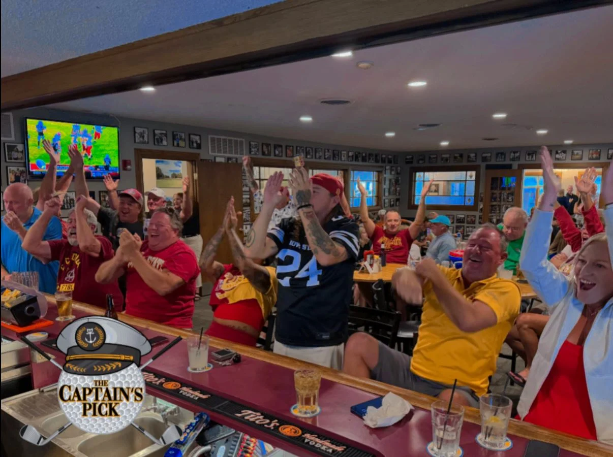 Excited patrons cheering in a lively bar during a sports event