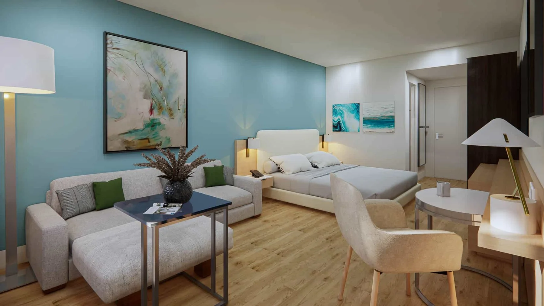 Guest room with sitting area at Hotel Manteo in Manteo, North Carolina
