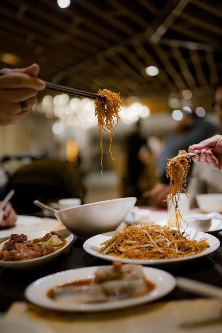 A restaurant chef preparing a dish