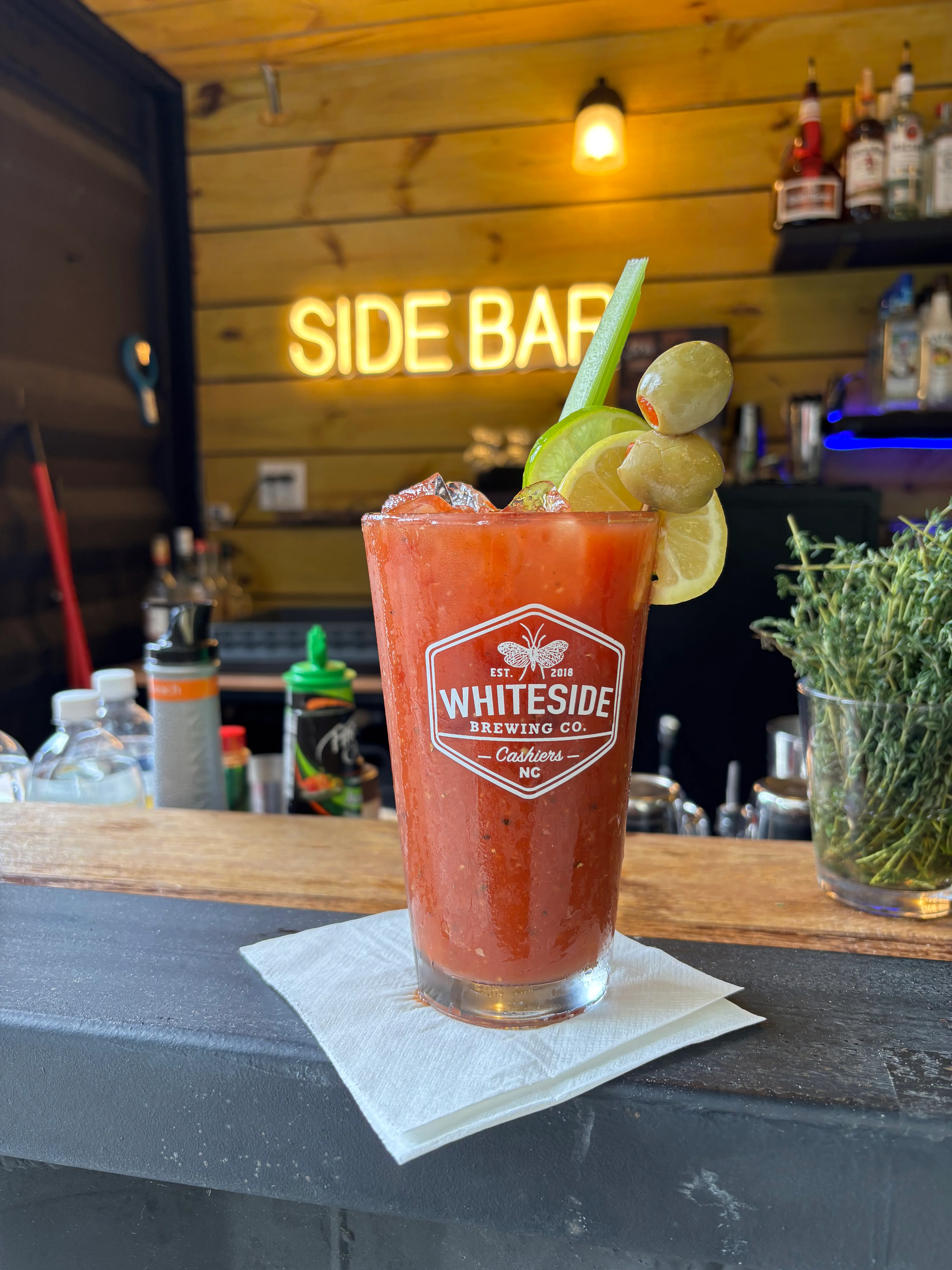 Refreshing Bloody Mary cocktail at a vibrant bar