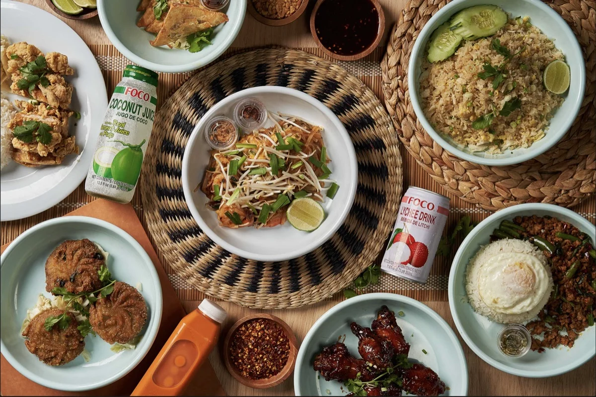 Assorted Asian dishes including pad thai and fried rice