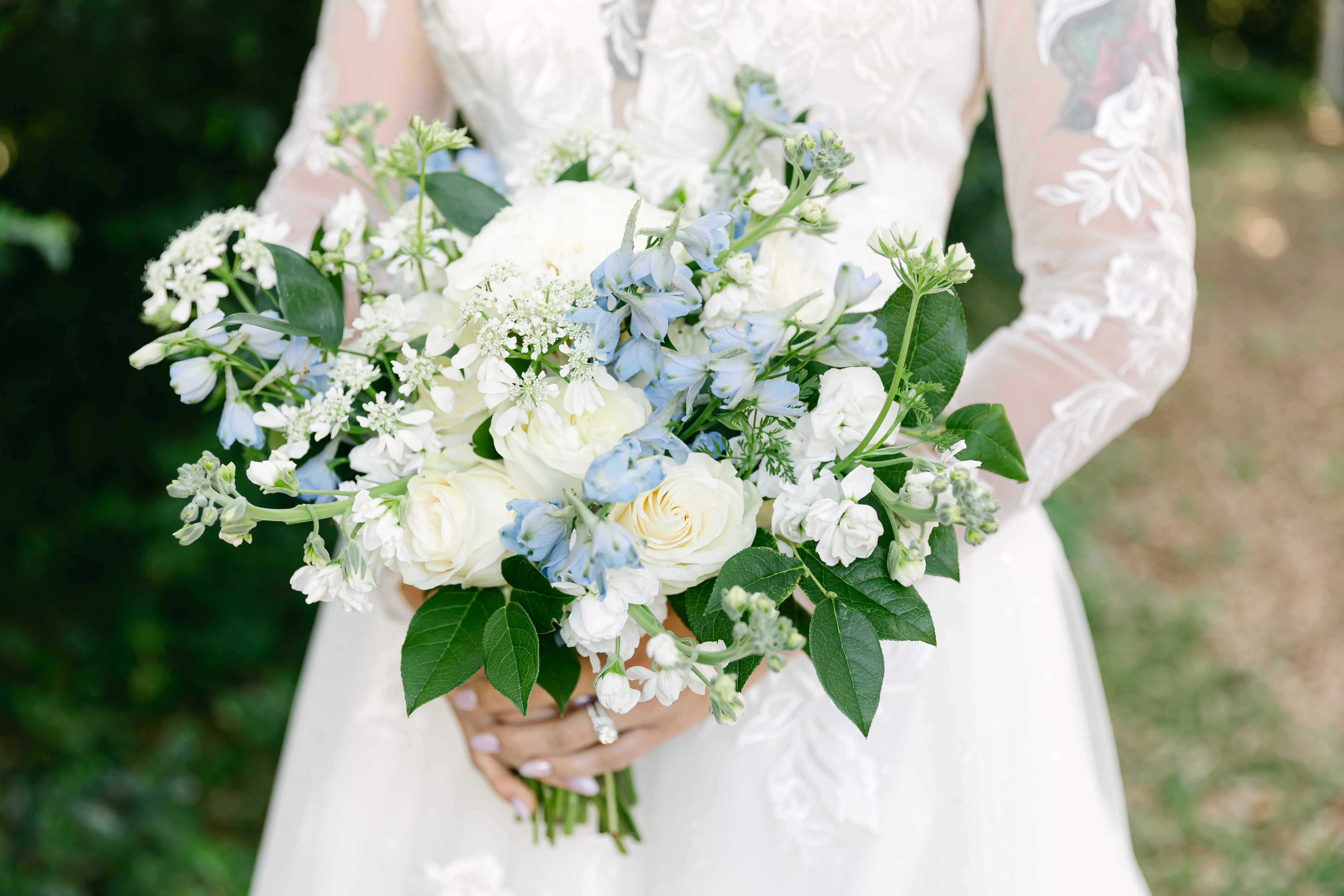 Elegant bridal bouquet with white and blue flowers