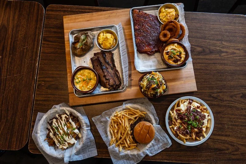 Assorted barbecue platter featuring brisket and ribs