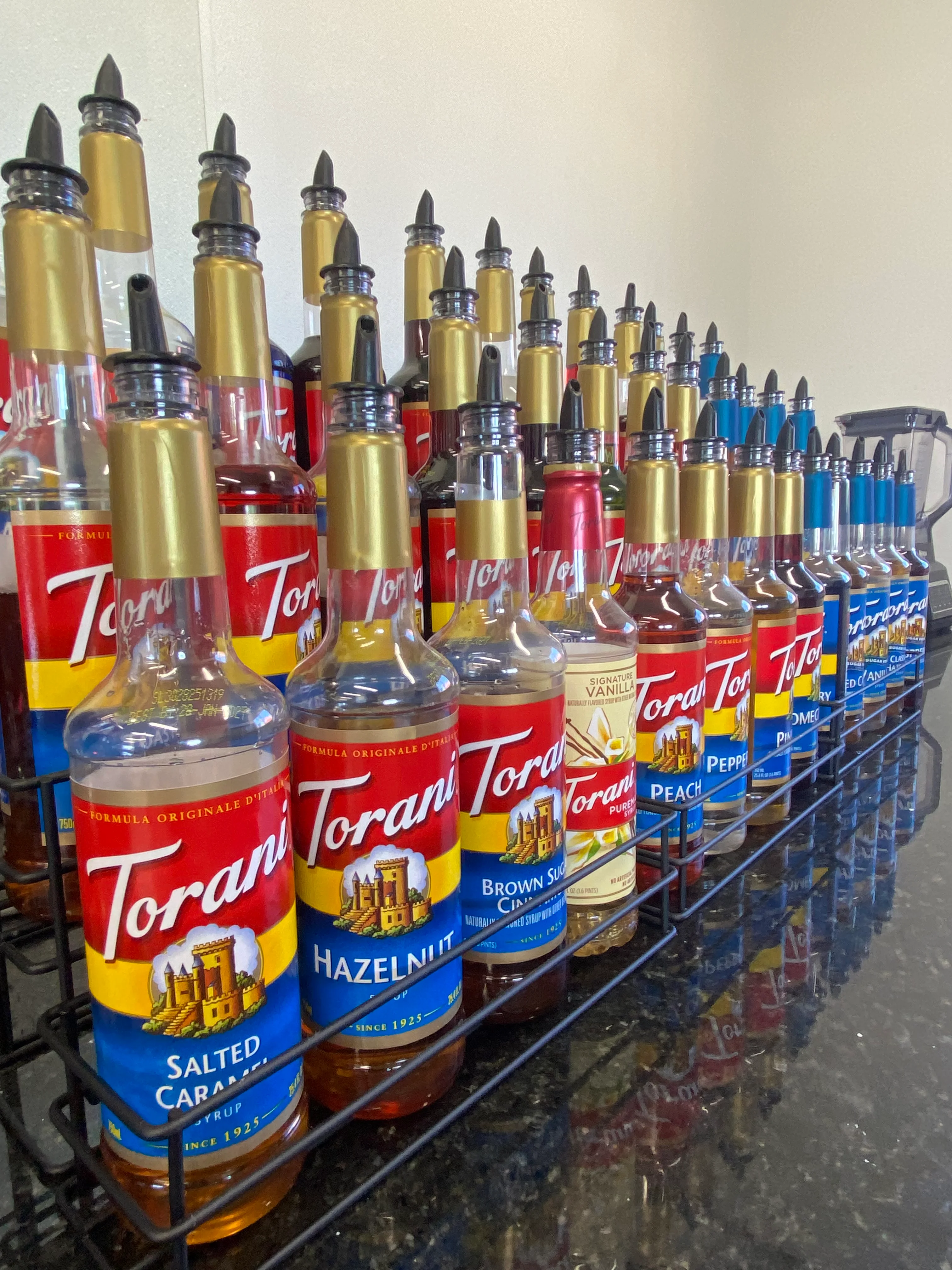 Variety of Torani flavored syrups on display