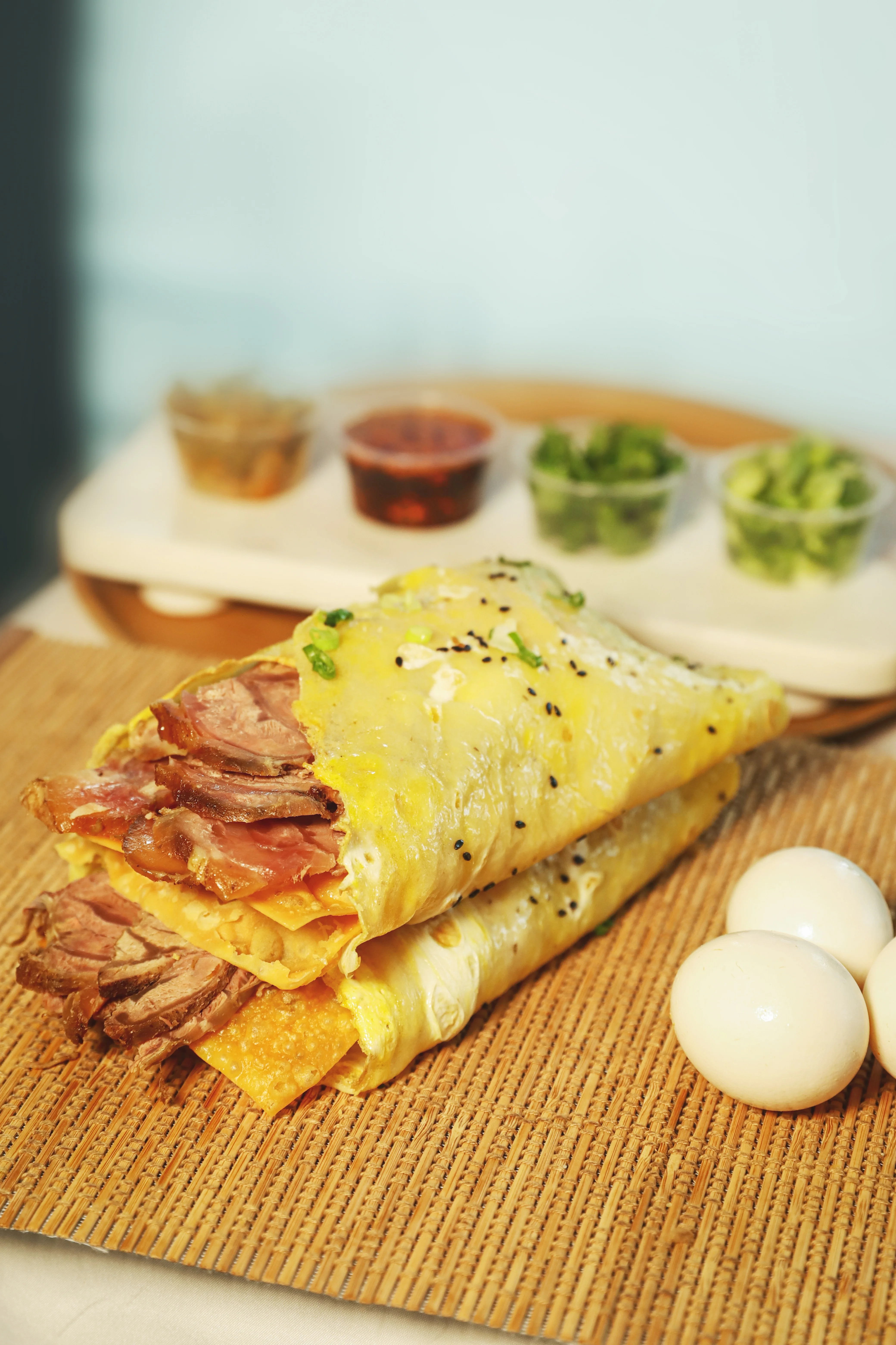 Chinese beef egg crepe roll with dipping sauces