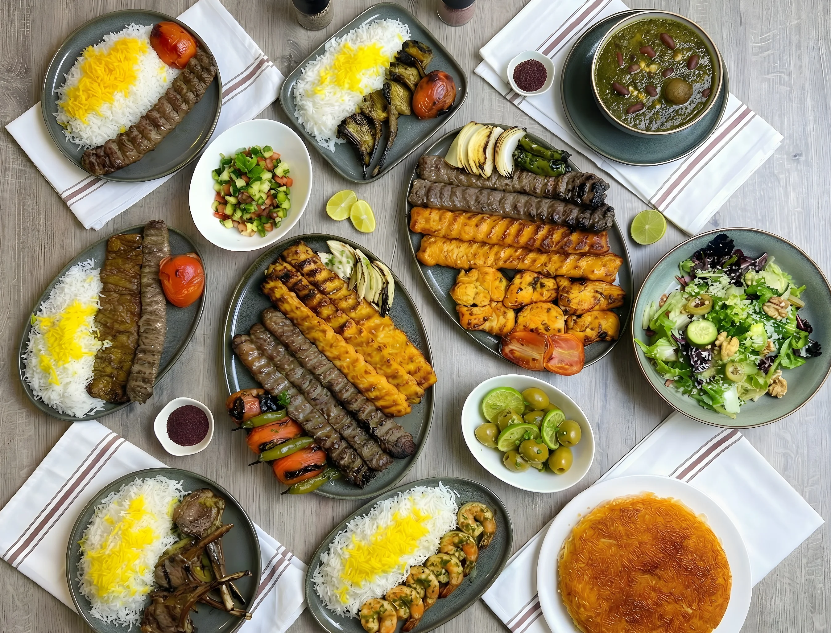 Assorted Persian kebabs with saffron rice and fresh herbs