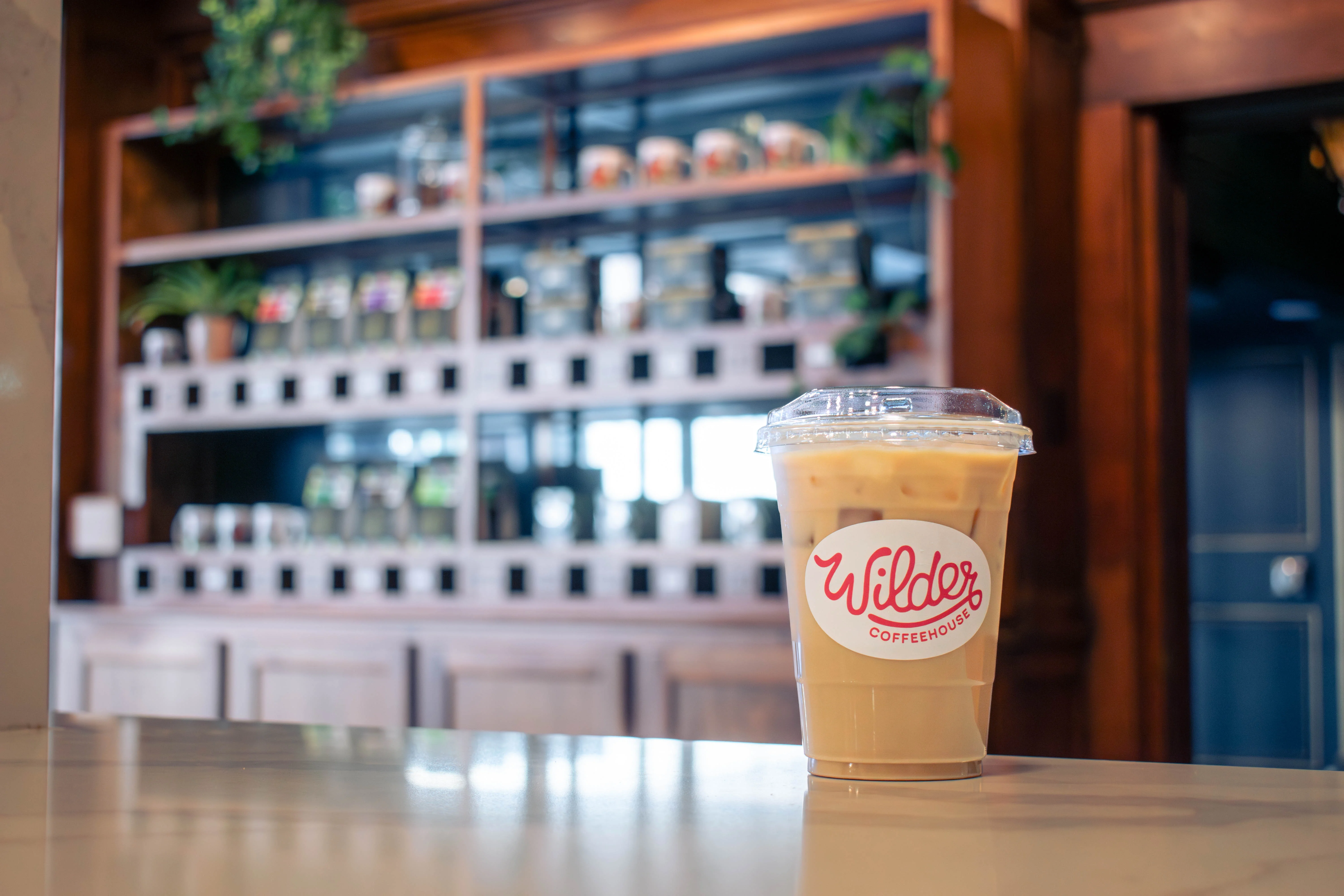 Wilder cup of ice coffee on counter