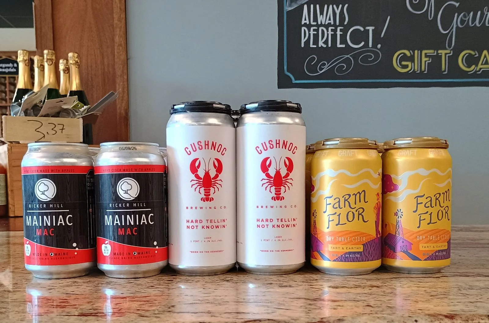 Selection of craft beers and ciders displayed on a countertop
