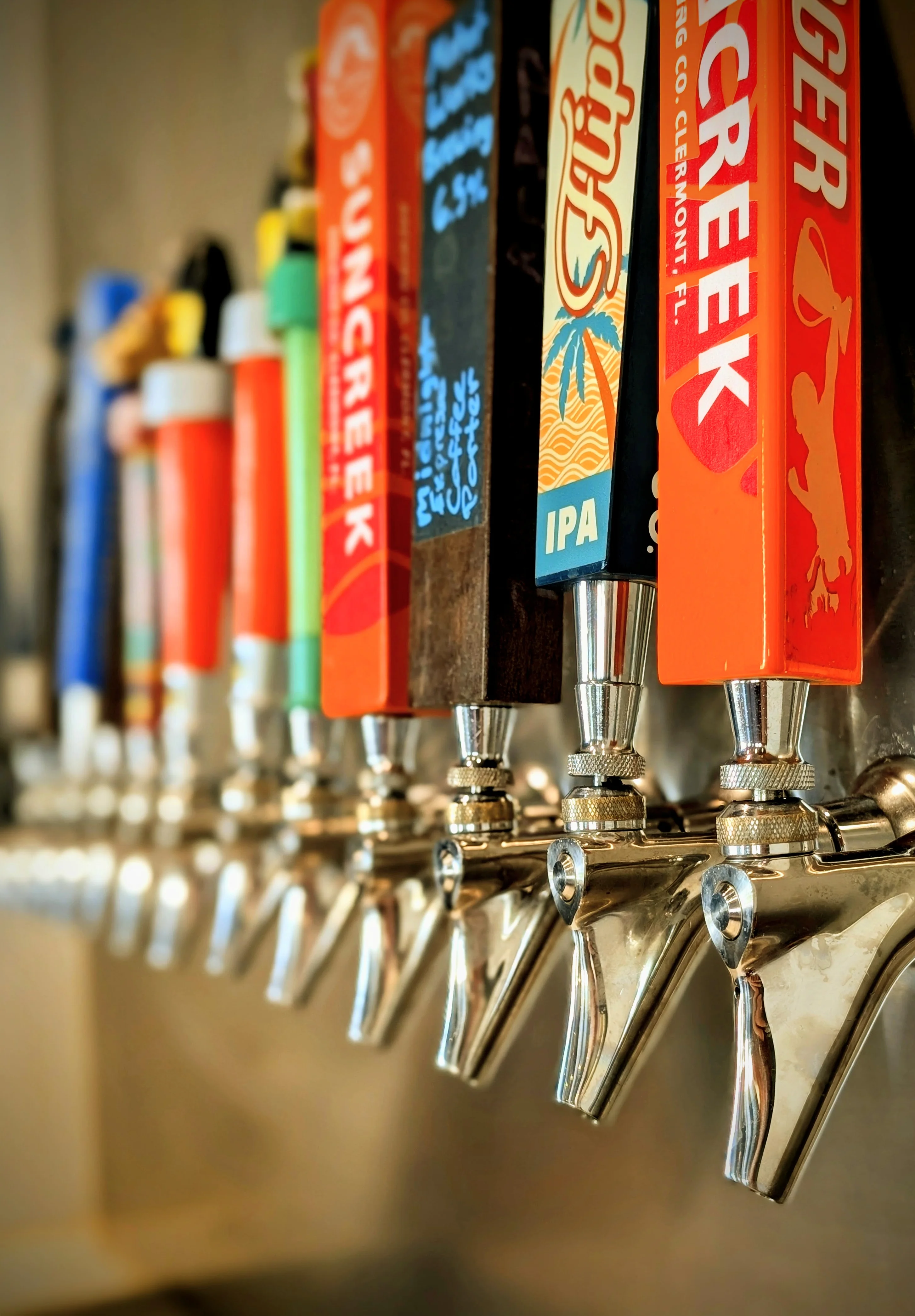 Craft beer taps featuring various local brews