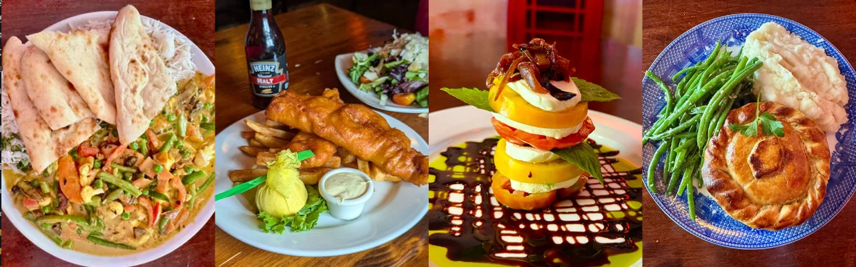 Assorted global dishes including curry, fish and chips, and layered salad