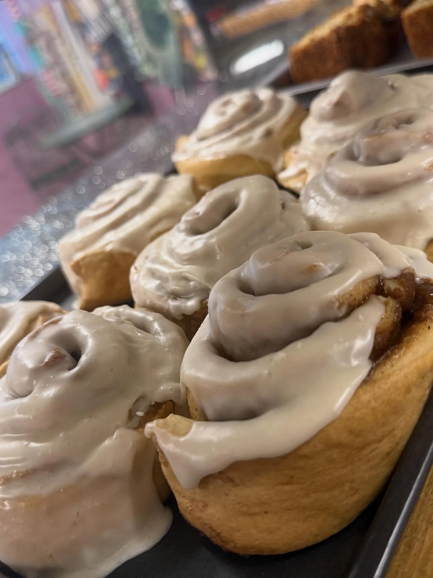 Freshly baked cinnamon rolls with creamy icing