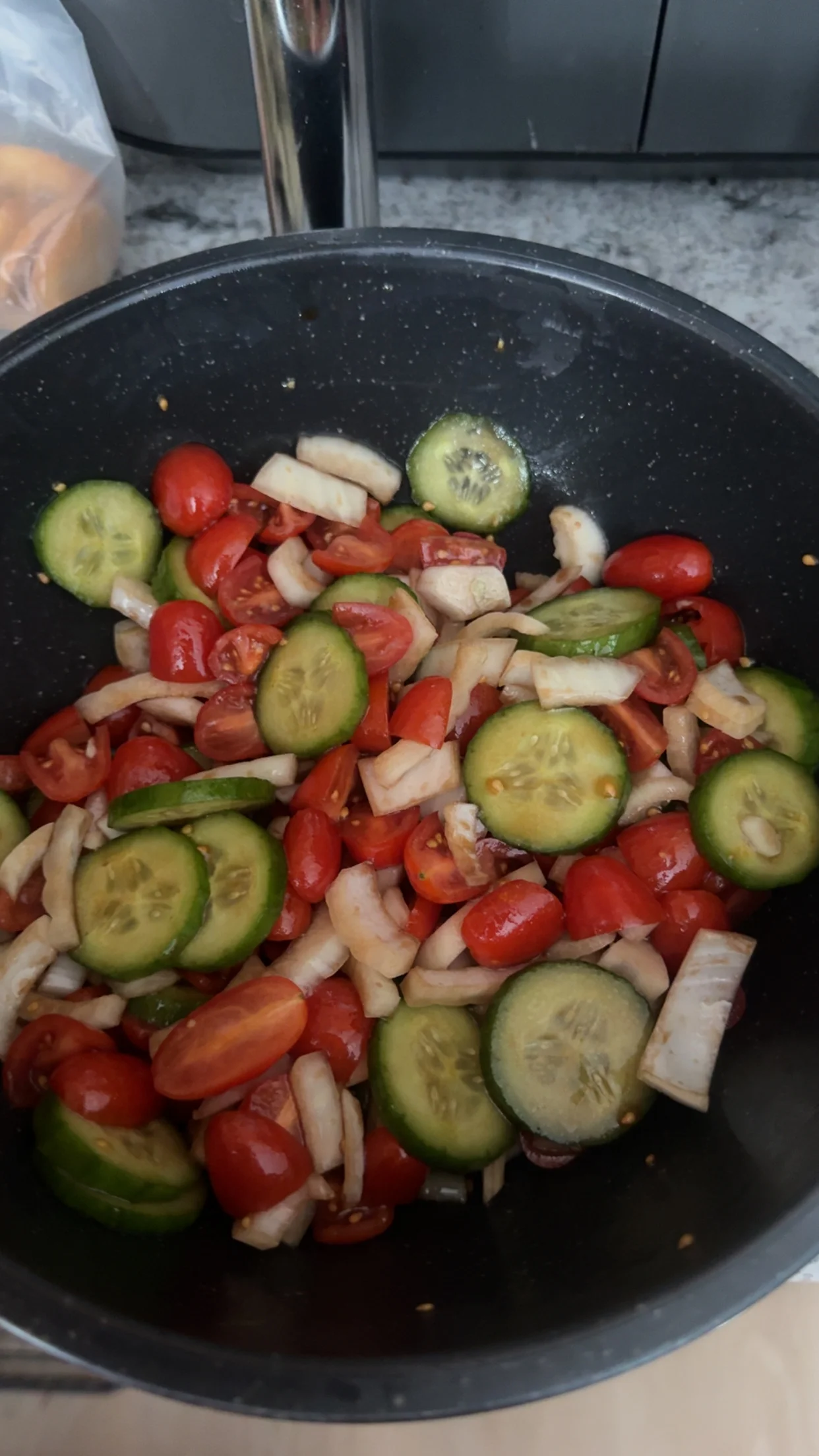 Fresh Mediterranean salad with cucumbers and cherry tomatoes