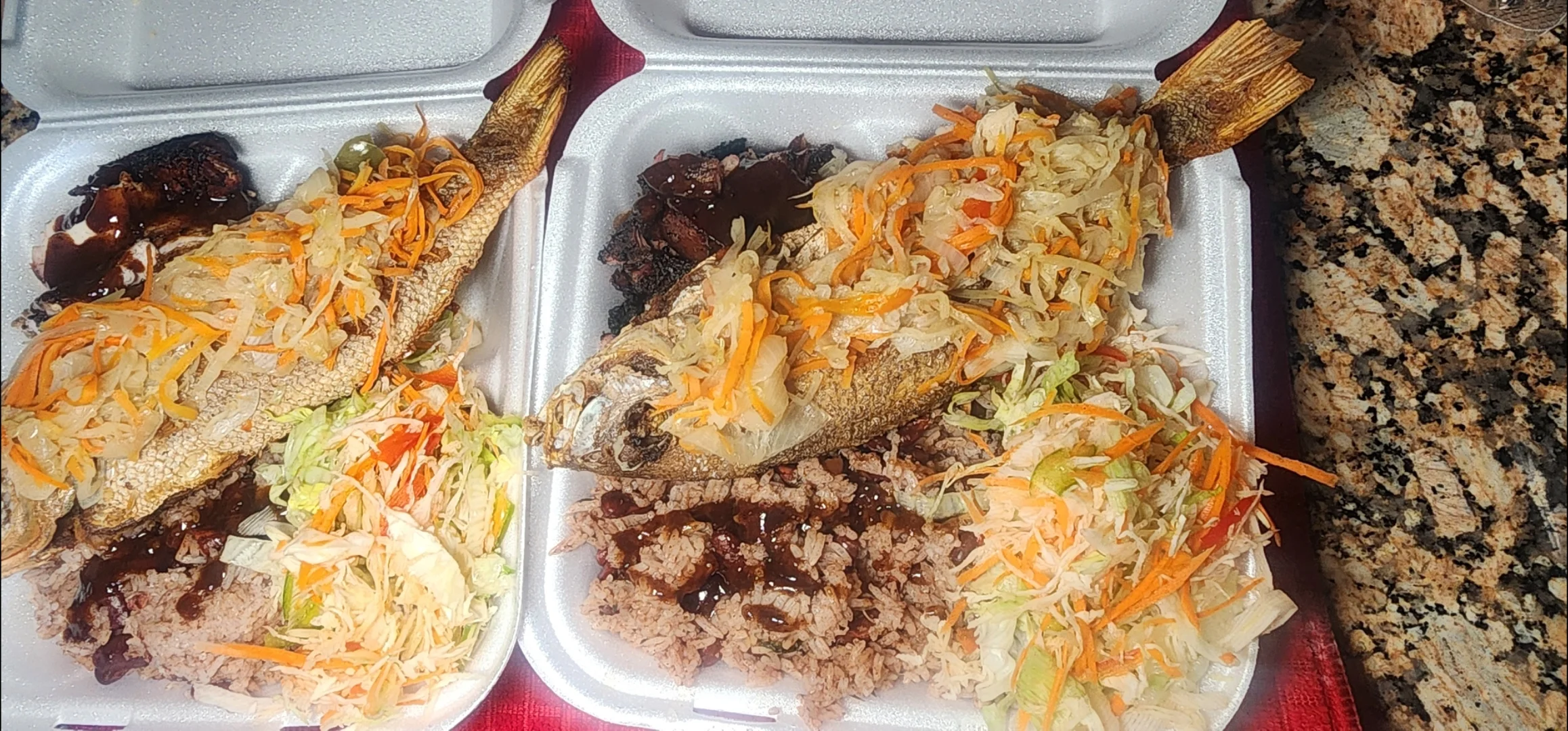 Jamaican escovitch fish with rice and vegetables