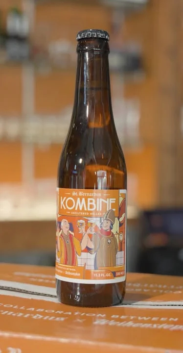 Bottle of St. Bernardus Kombine beer with colorful label design