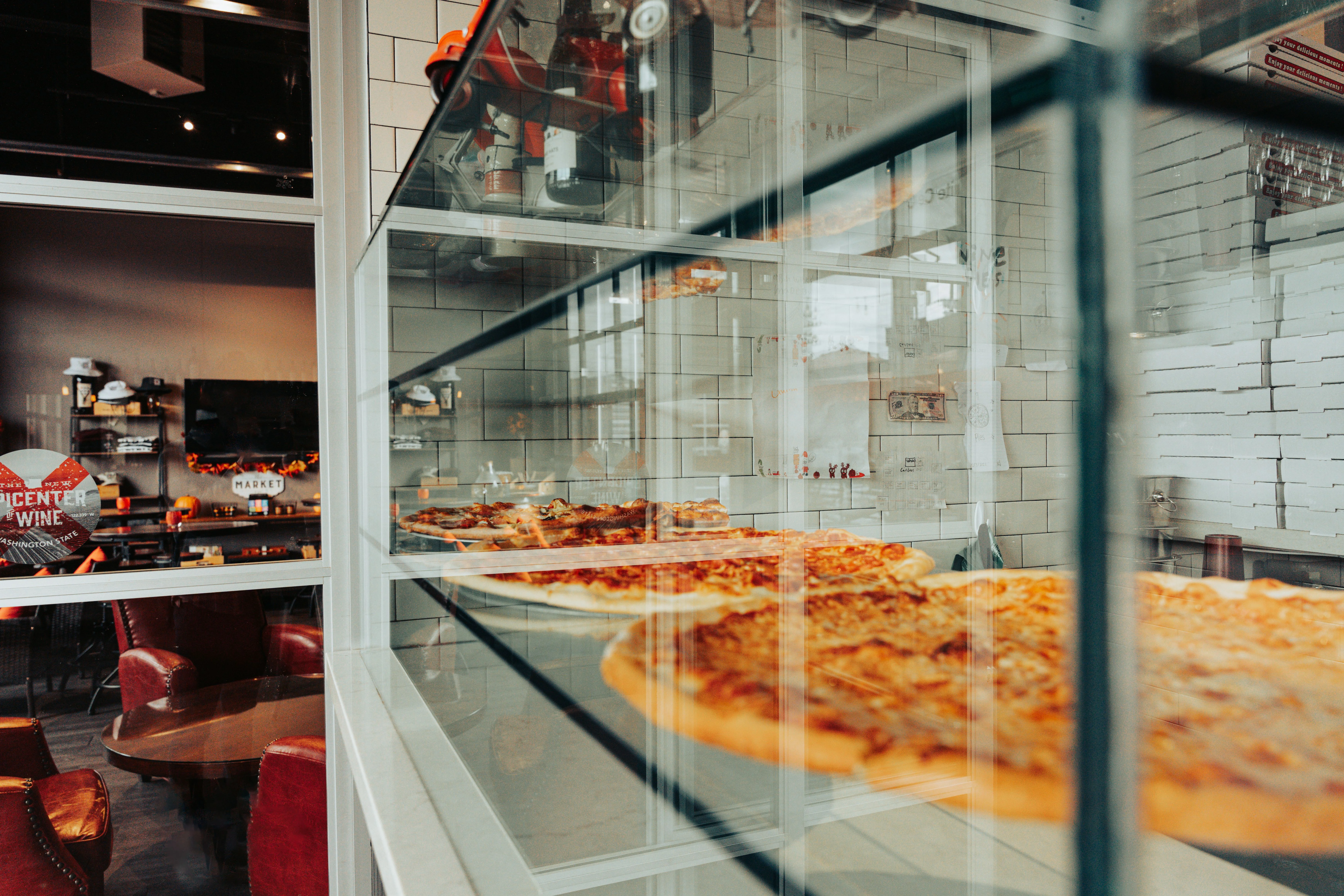 Display of Margherita pizza in a modern restaurant