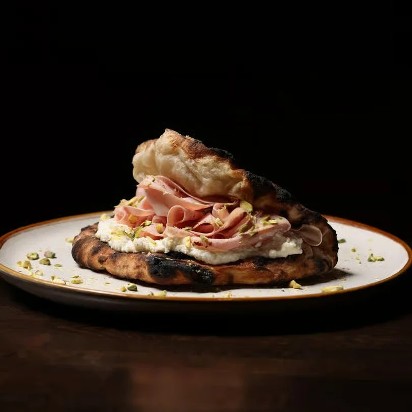 Italian focaccia sandwich with ham and ricotta