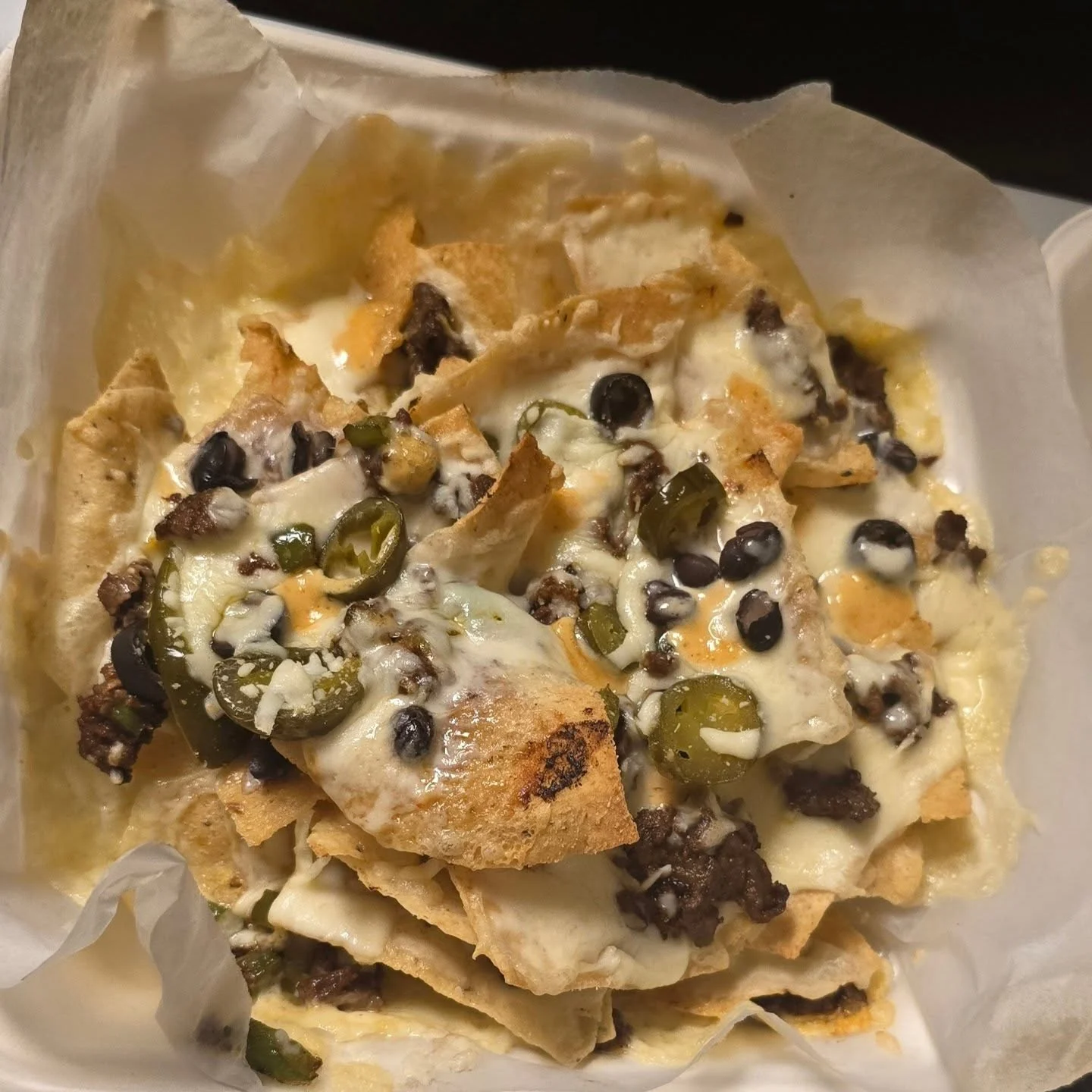 Loaded nachos with cheese and beef