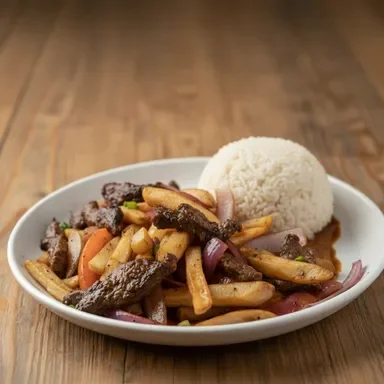 Peruvian lomo saltado with rice and fries