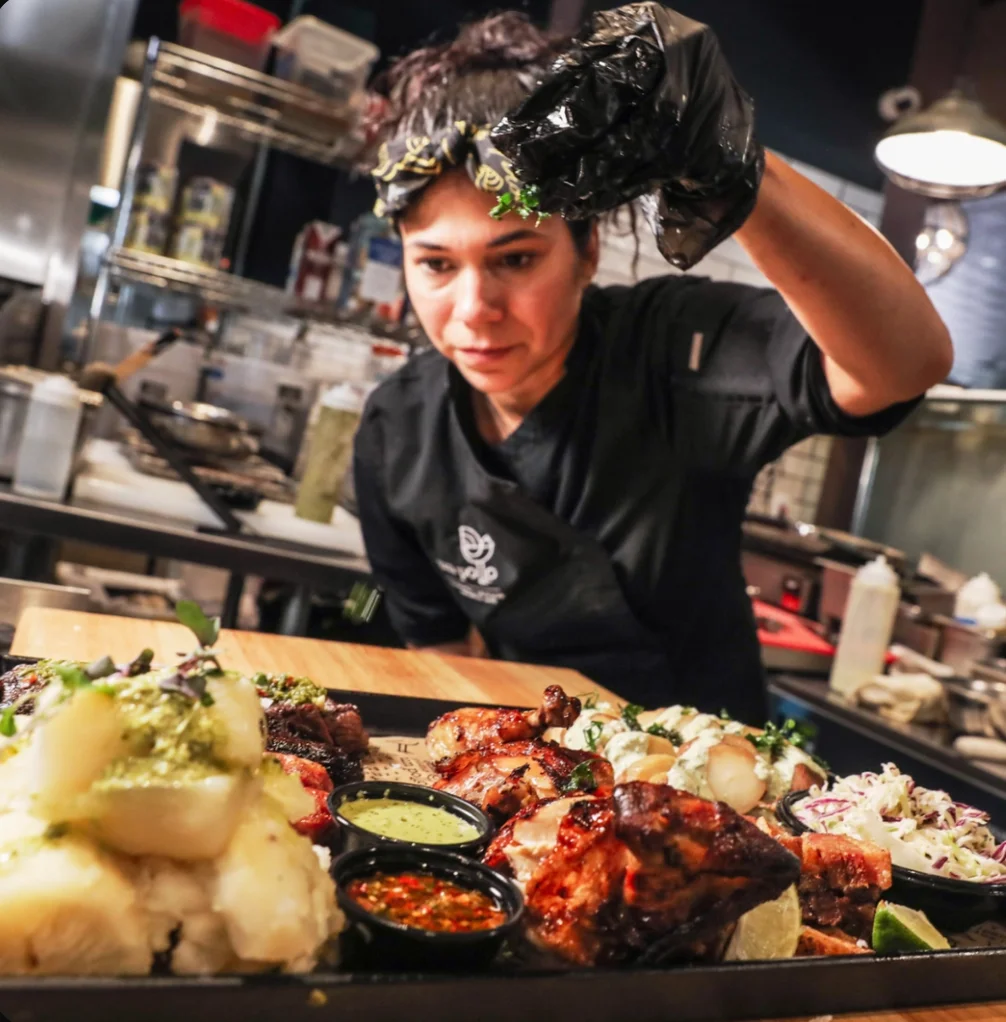 A restaurant chef preparing a dish