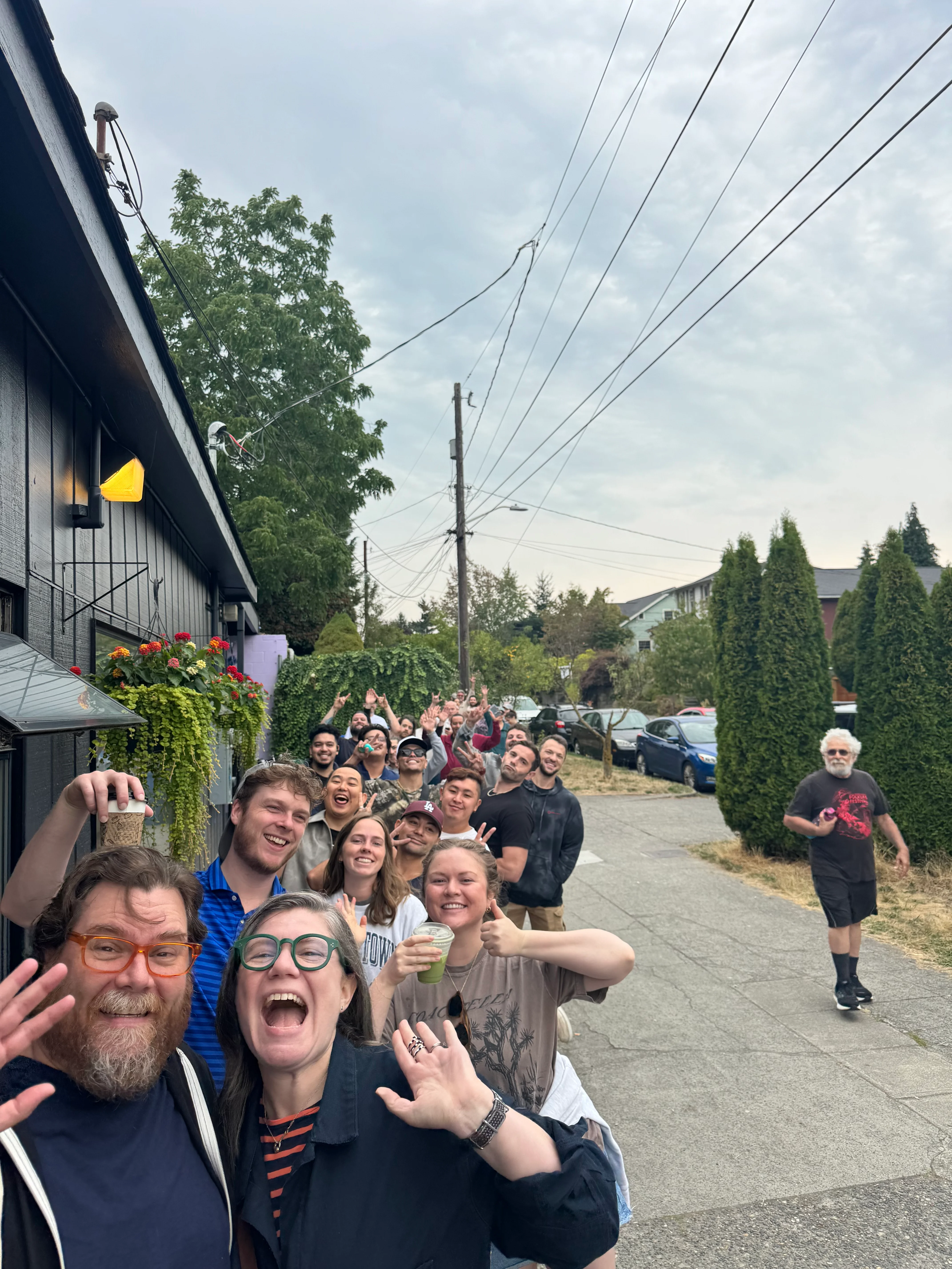 Group of friends enjoying a fun outing outside a restaurant