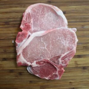 Fresh pork chops ready for grilling