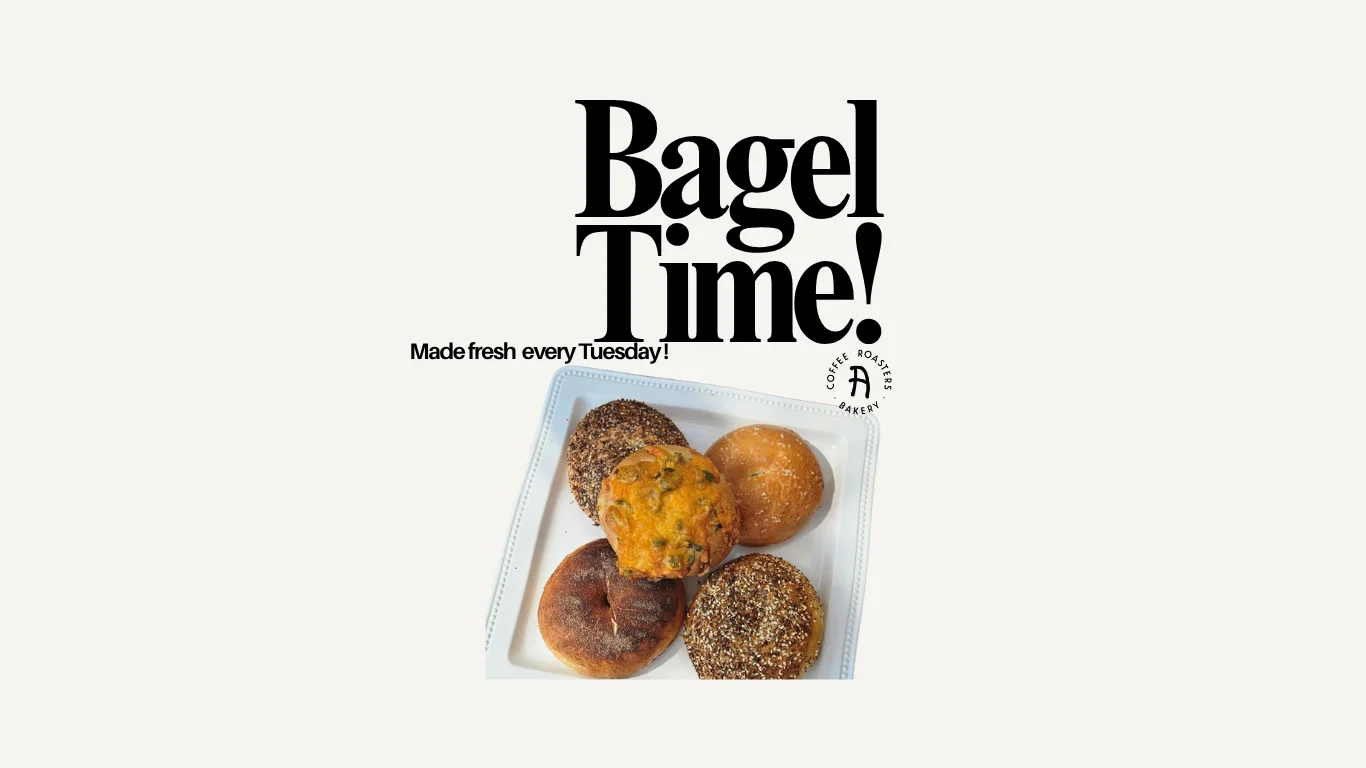 Freshly baked bagels on a serving tray