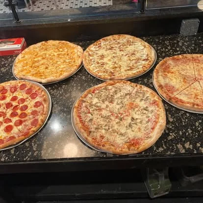 Variety of classic pizzas including pepperoni and cheese