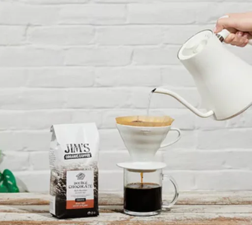 Pouring coffee through a filter for a fresh brew