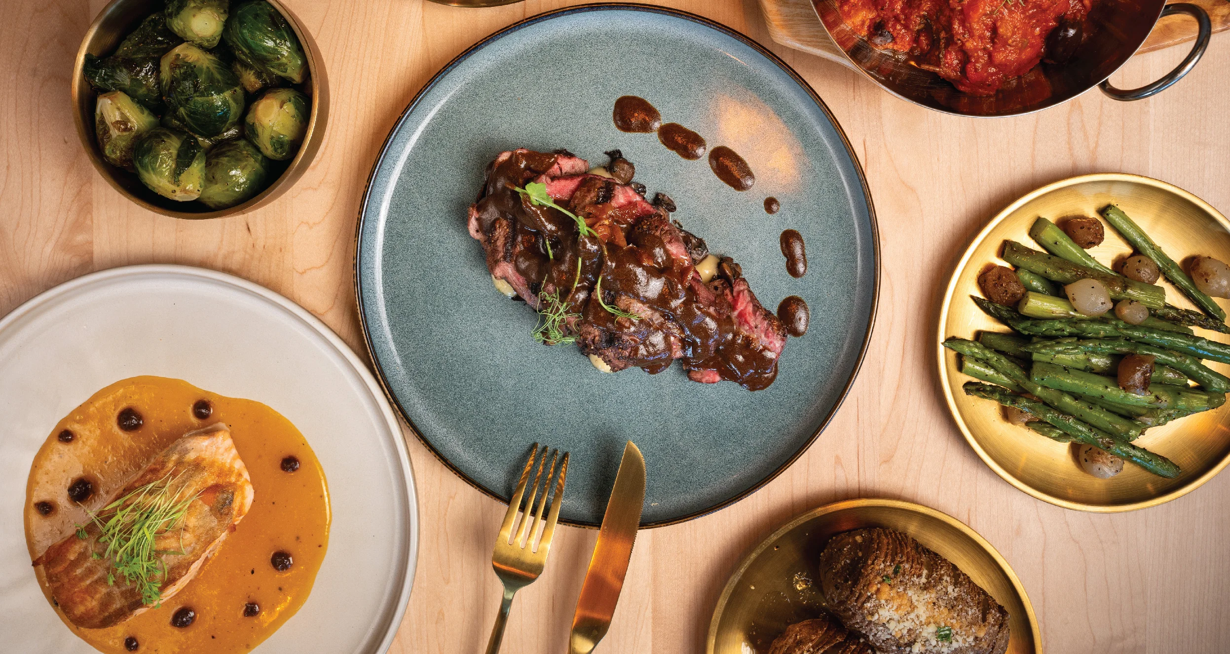 Elegant steak with rich sauce, served with seasonal vegetables
