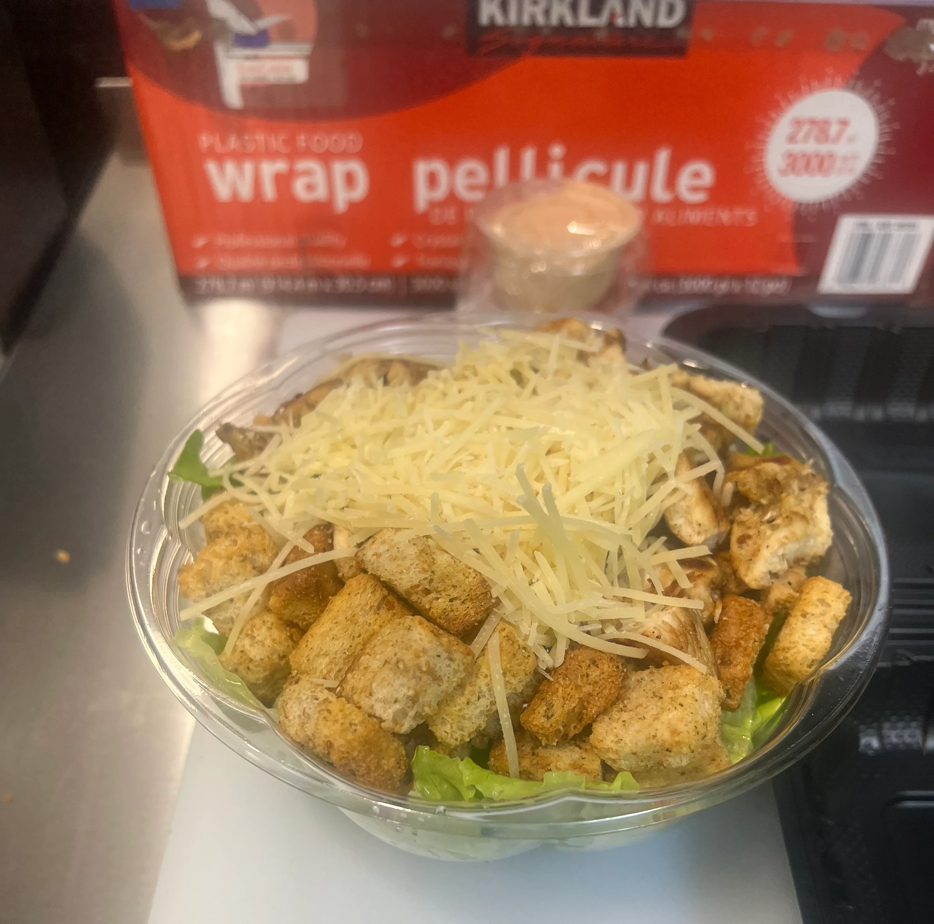 Caesar salad with grilled chicken and croutons