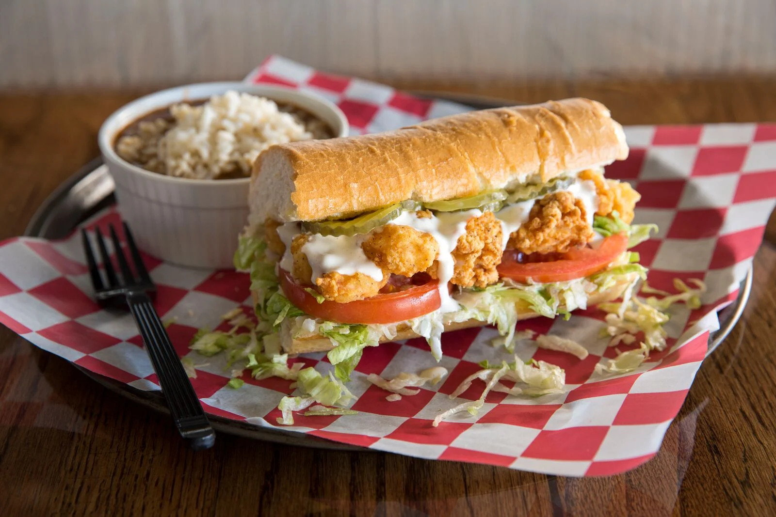 Southern fried shrimp po' boy sandwich with coleslaw