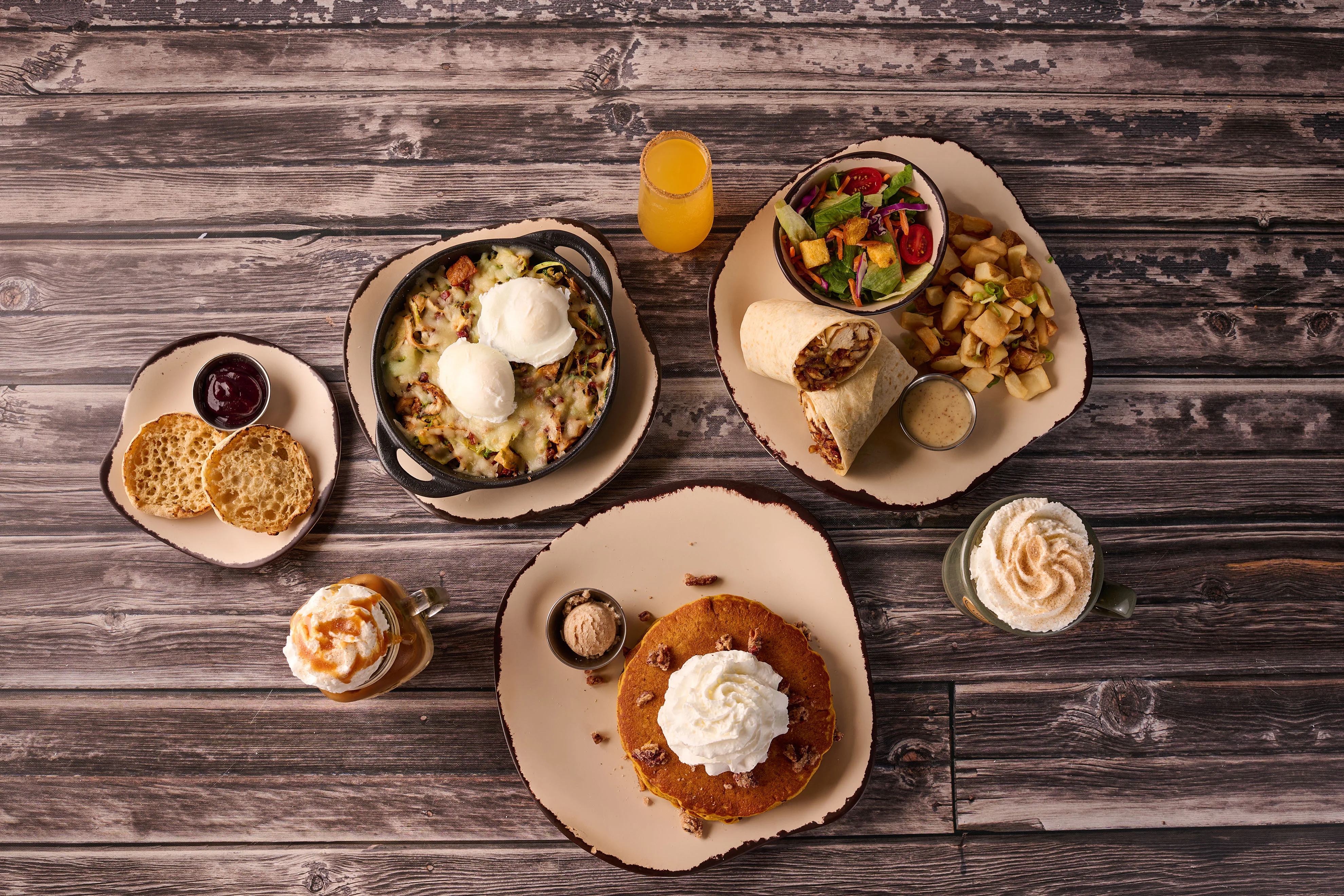 Delicious American breakfast with pancakes and steak fajitas