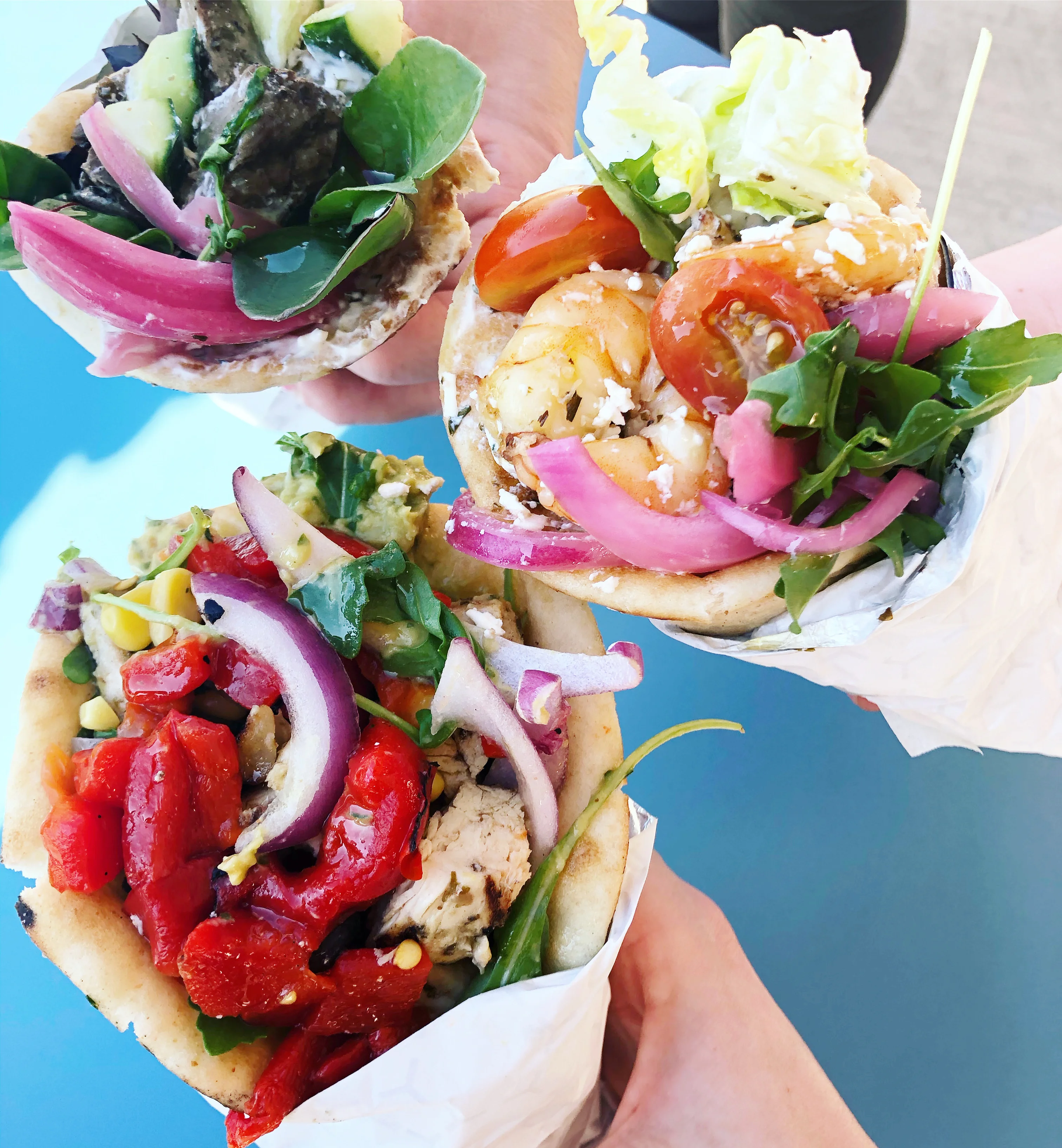 Mediterranean pita wraps with grilled shrimp and vegetables