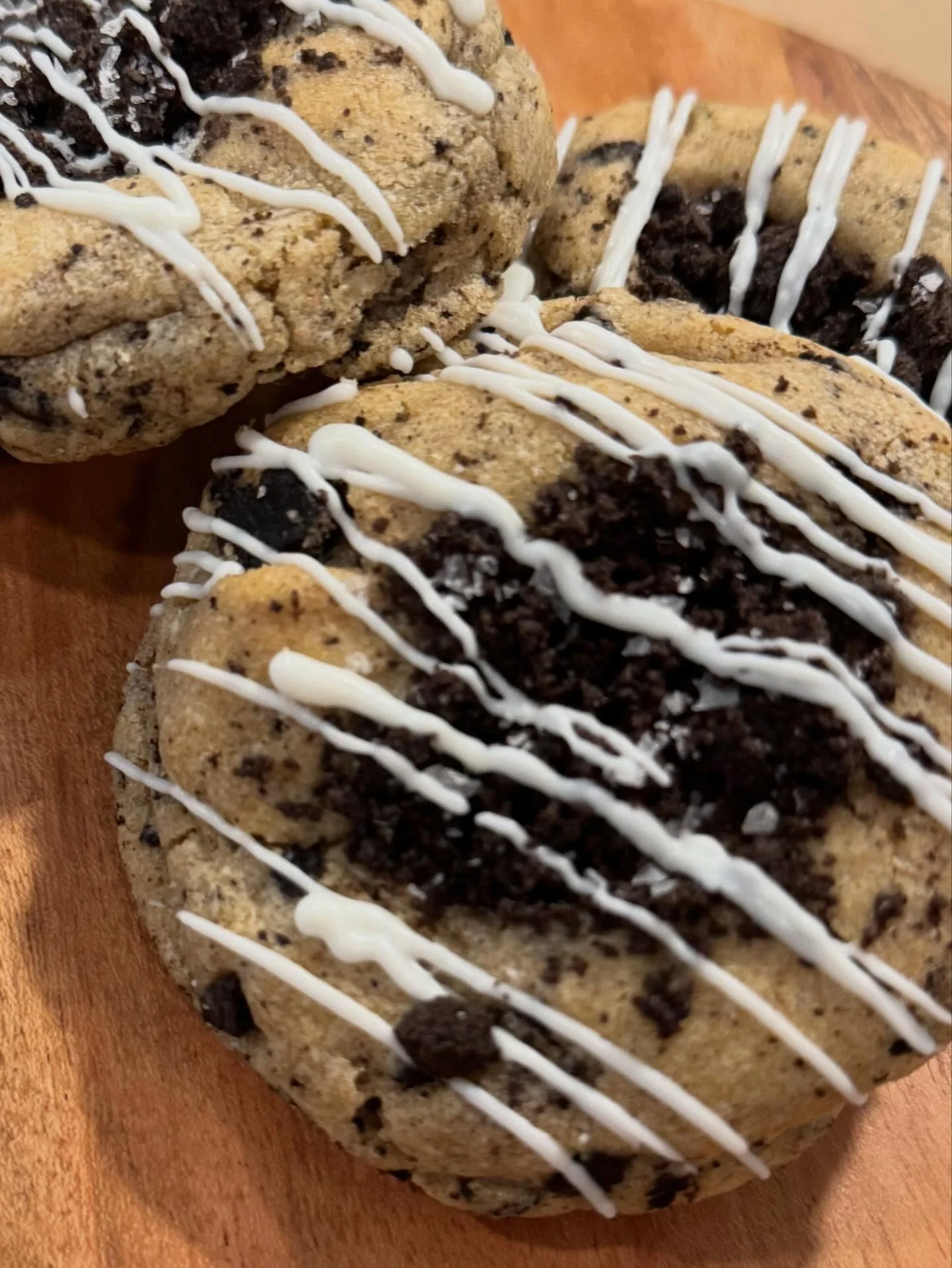 Decadent cookies with Oreo crumbles and white chocolate drizzle