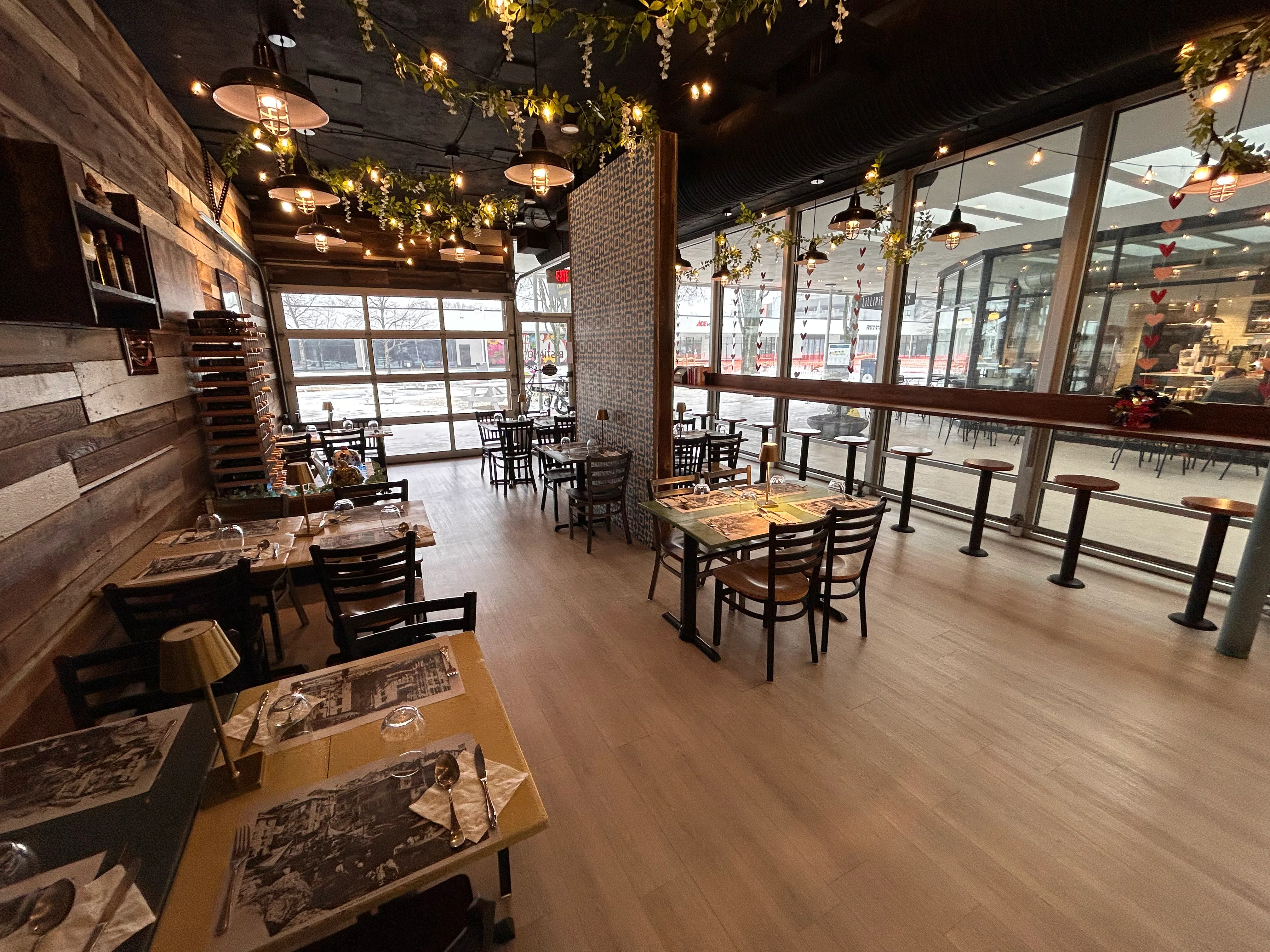 Cozy restaurant interior with warm lighting and wooden decor