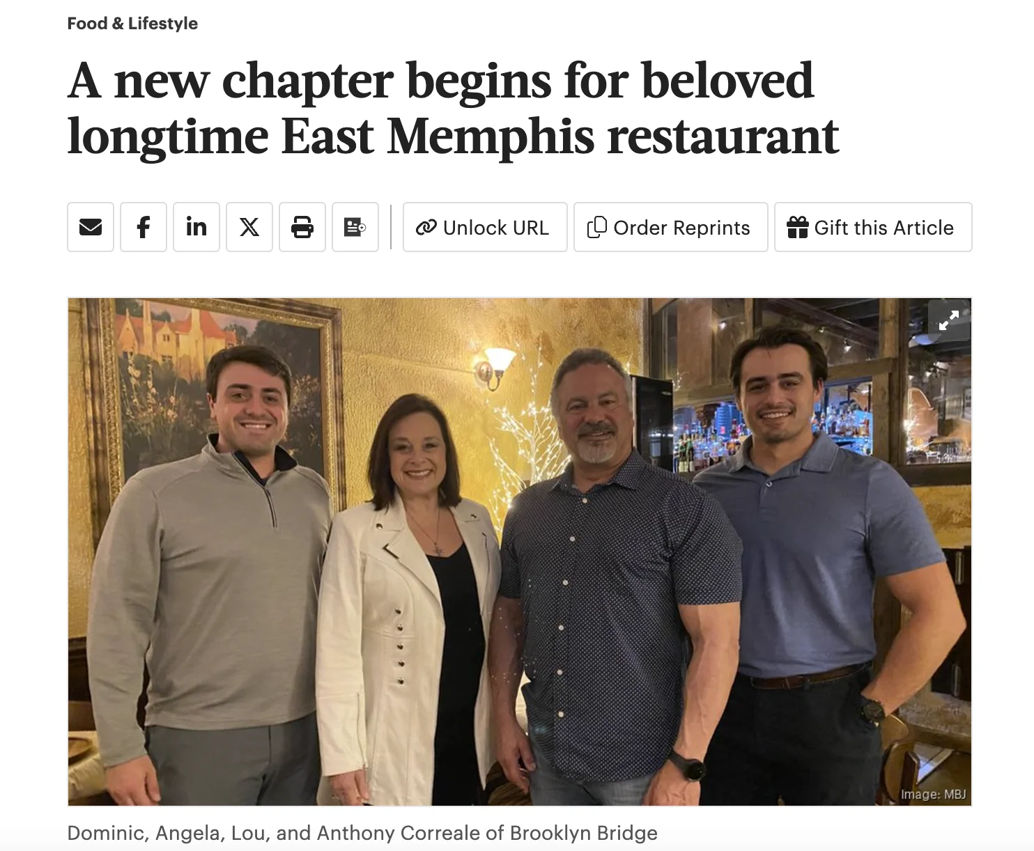 Group photo celebrating new chapter at East Memphis restaurant